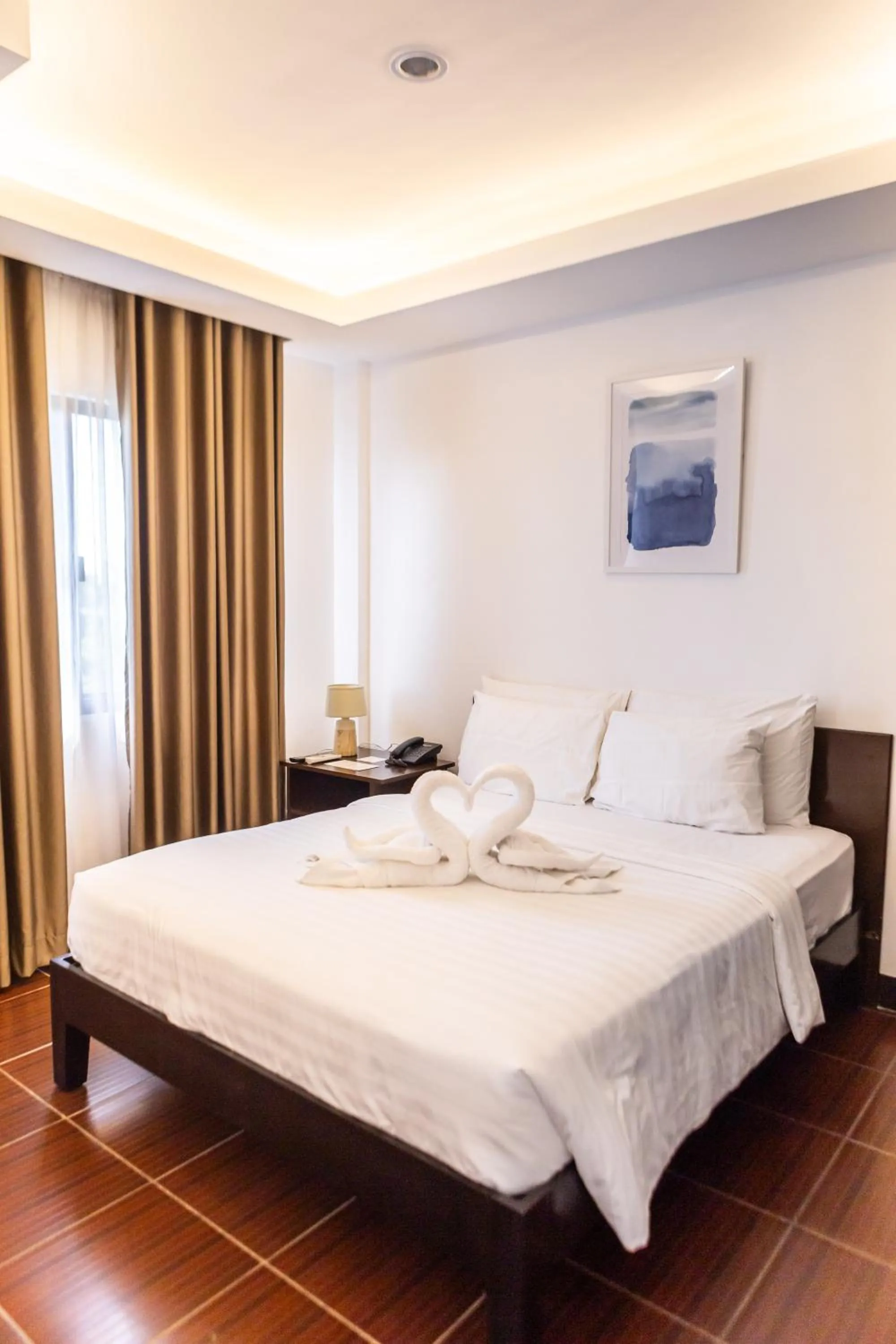 Bed in Palmbeach Resort Mactan Cebu powered by Cocotel