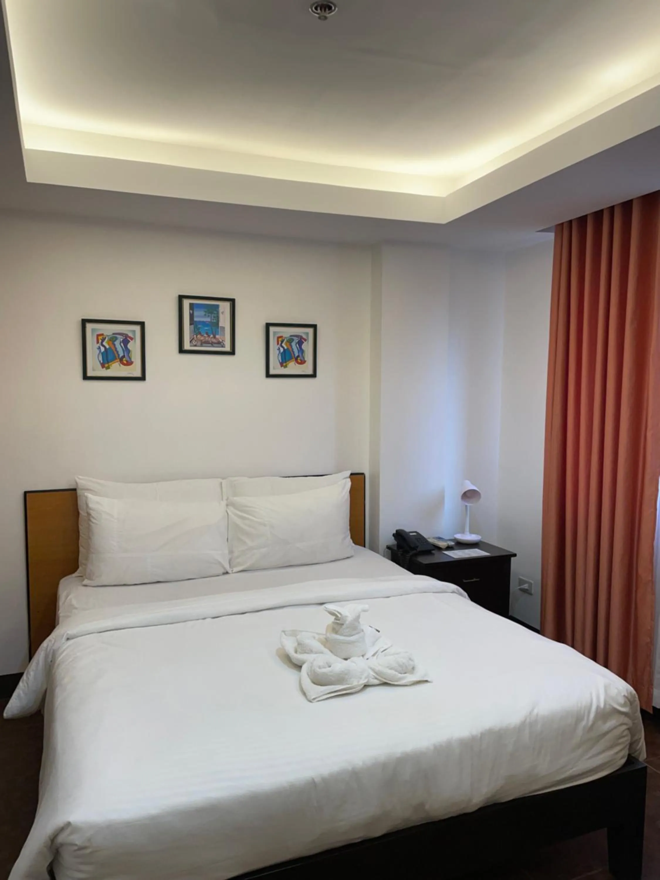 Bed in Palmbeach Resort Mactan Cebu powered by Cocotel