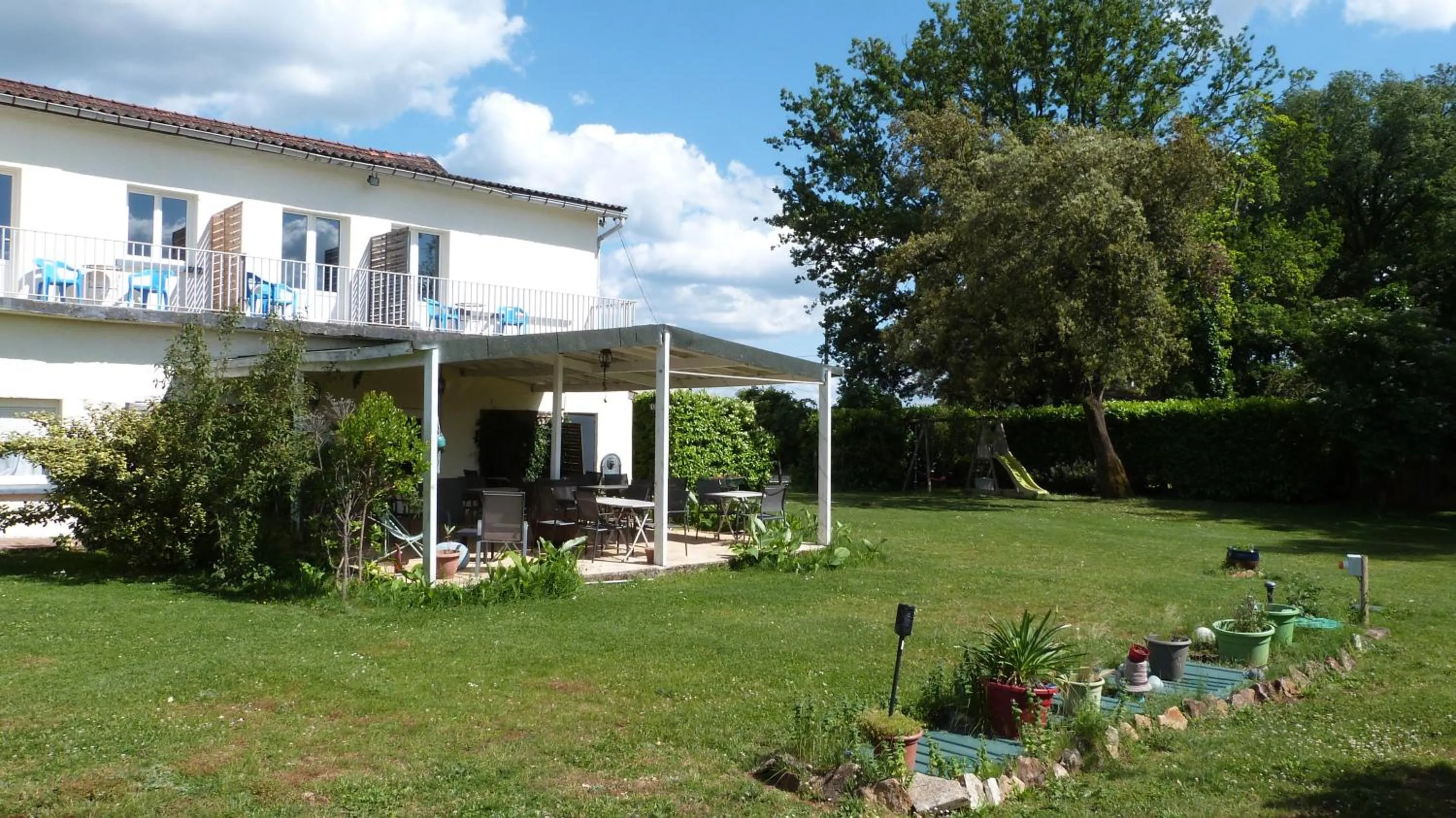 Garden in Logis Hôtel Restaurant La Borie