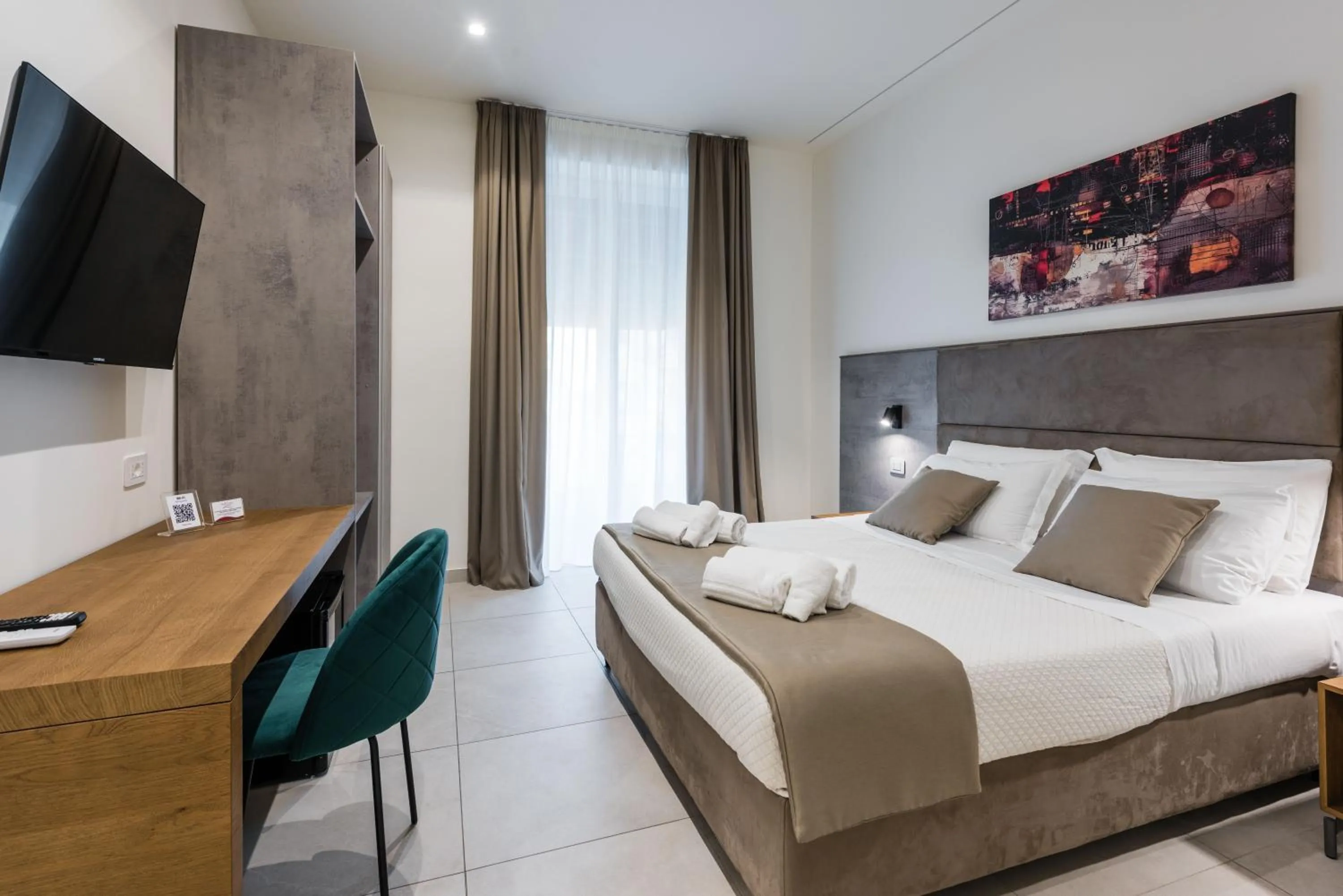 Bed in BeBIGEA Rooms