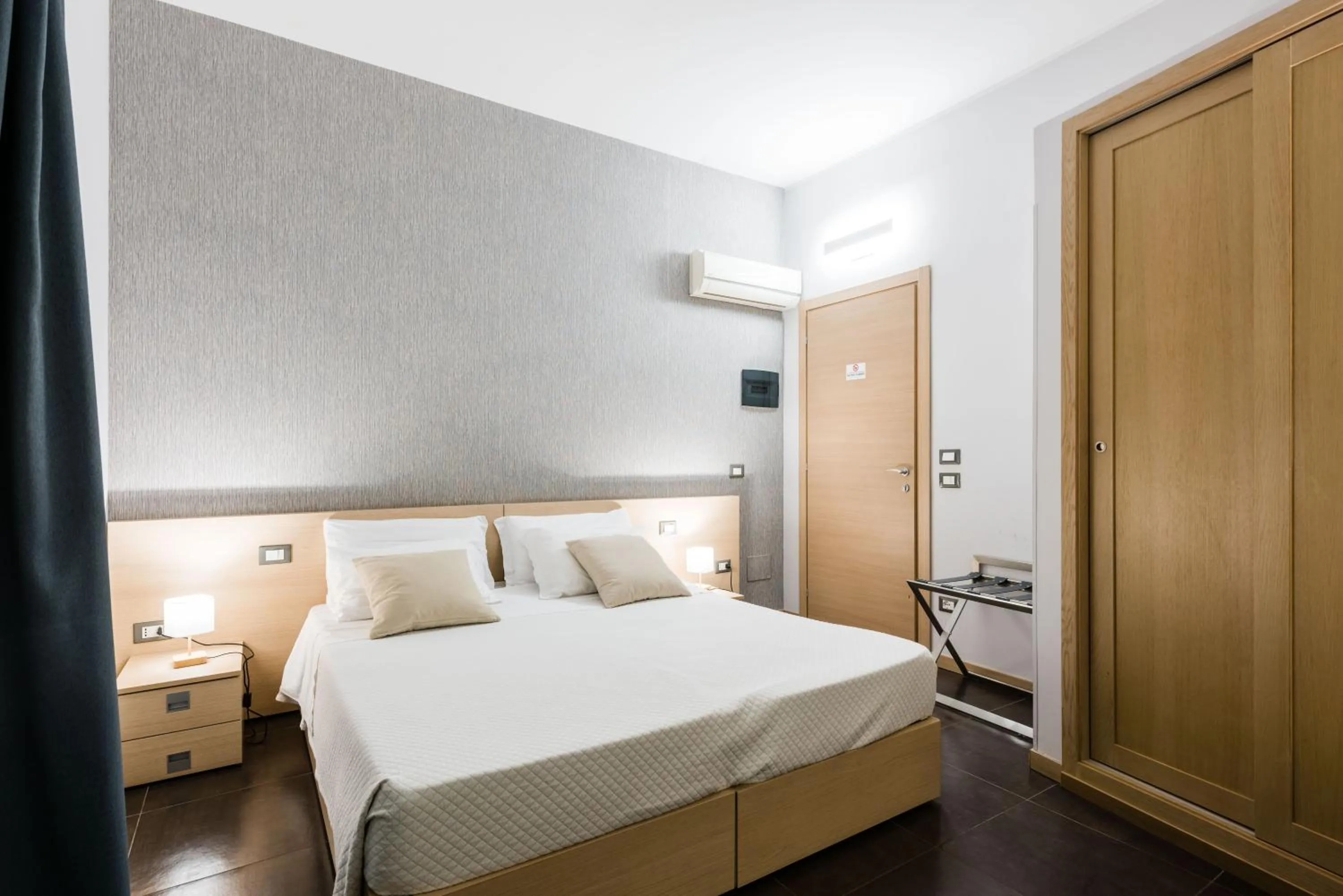 Bed in BeBIGEA Rooms