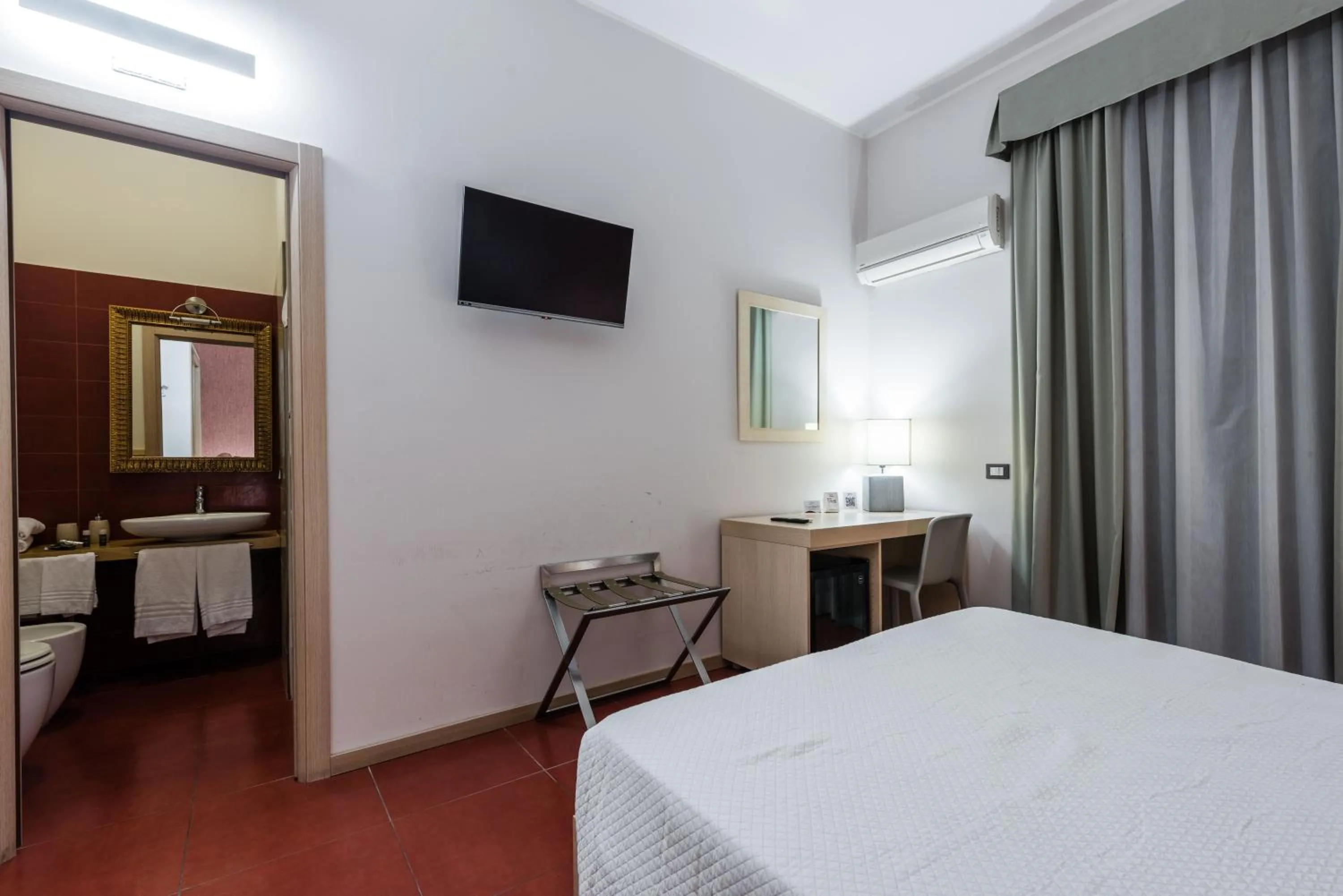 Bed in BeBIGEA Rooms