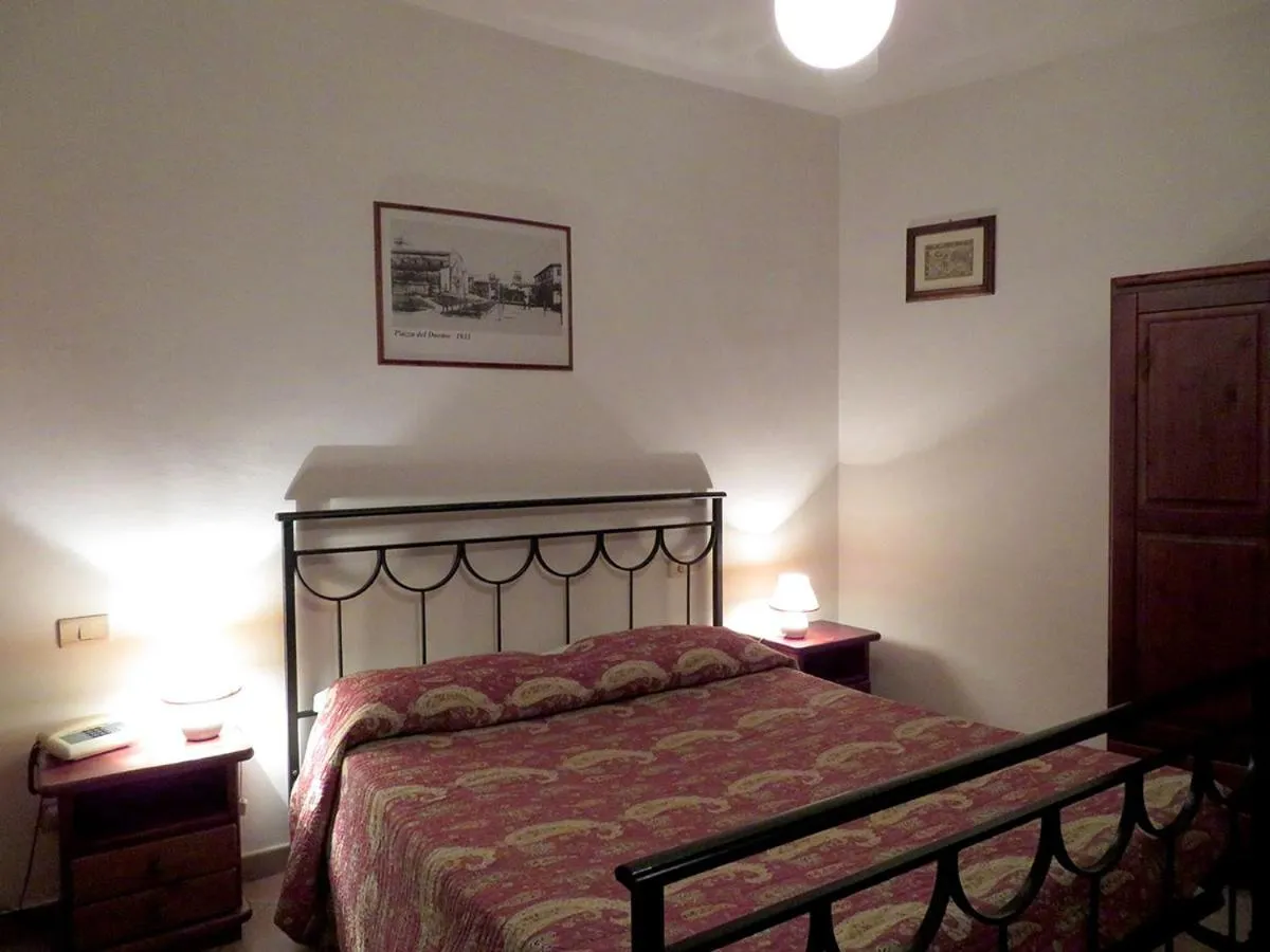 Photo of the whole room, Bed in Albergo La Perla