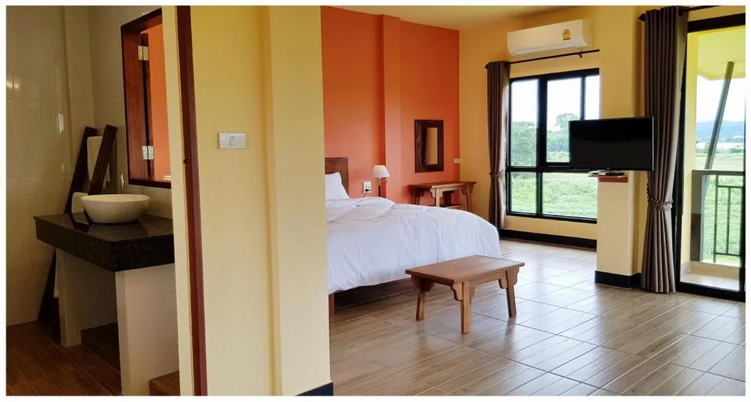 Bed in Baan Sakuna Hotel