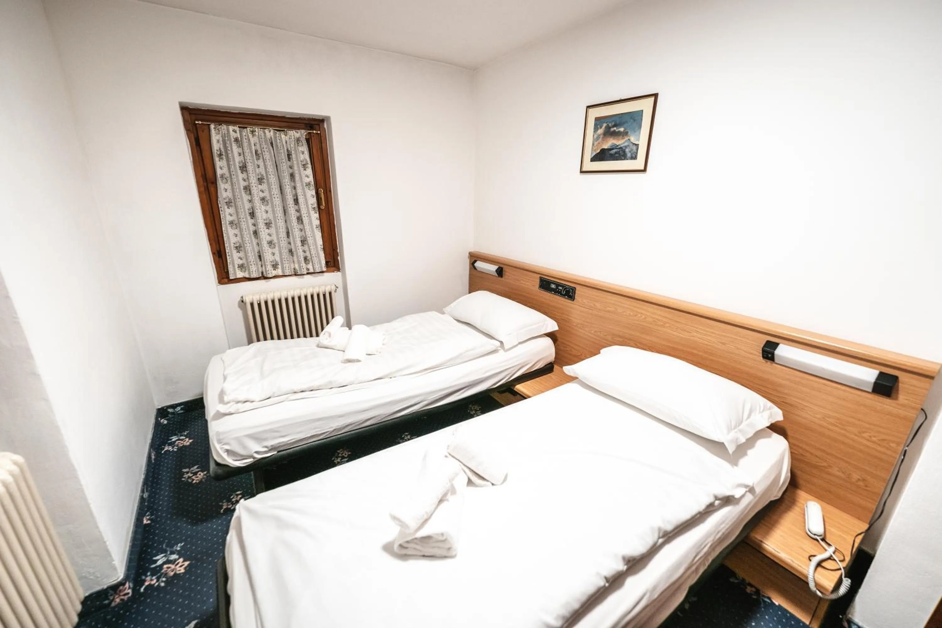 Bed in Smart Hotel Renzi