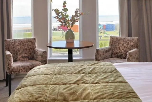 Bed in The Marine Hotel