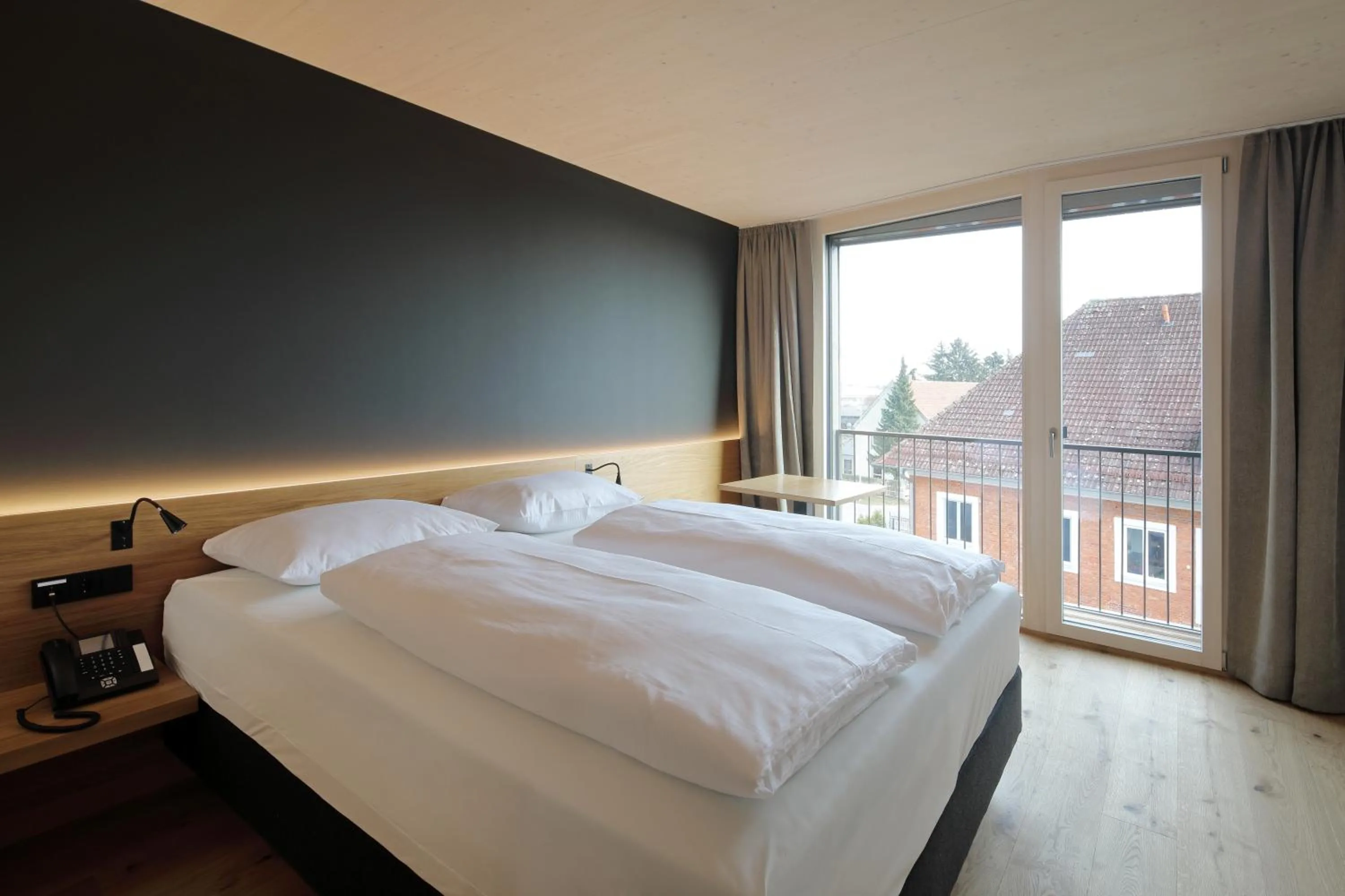 Photo of the whole room, Bed in 2ND HOME HOTEL