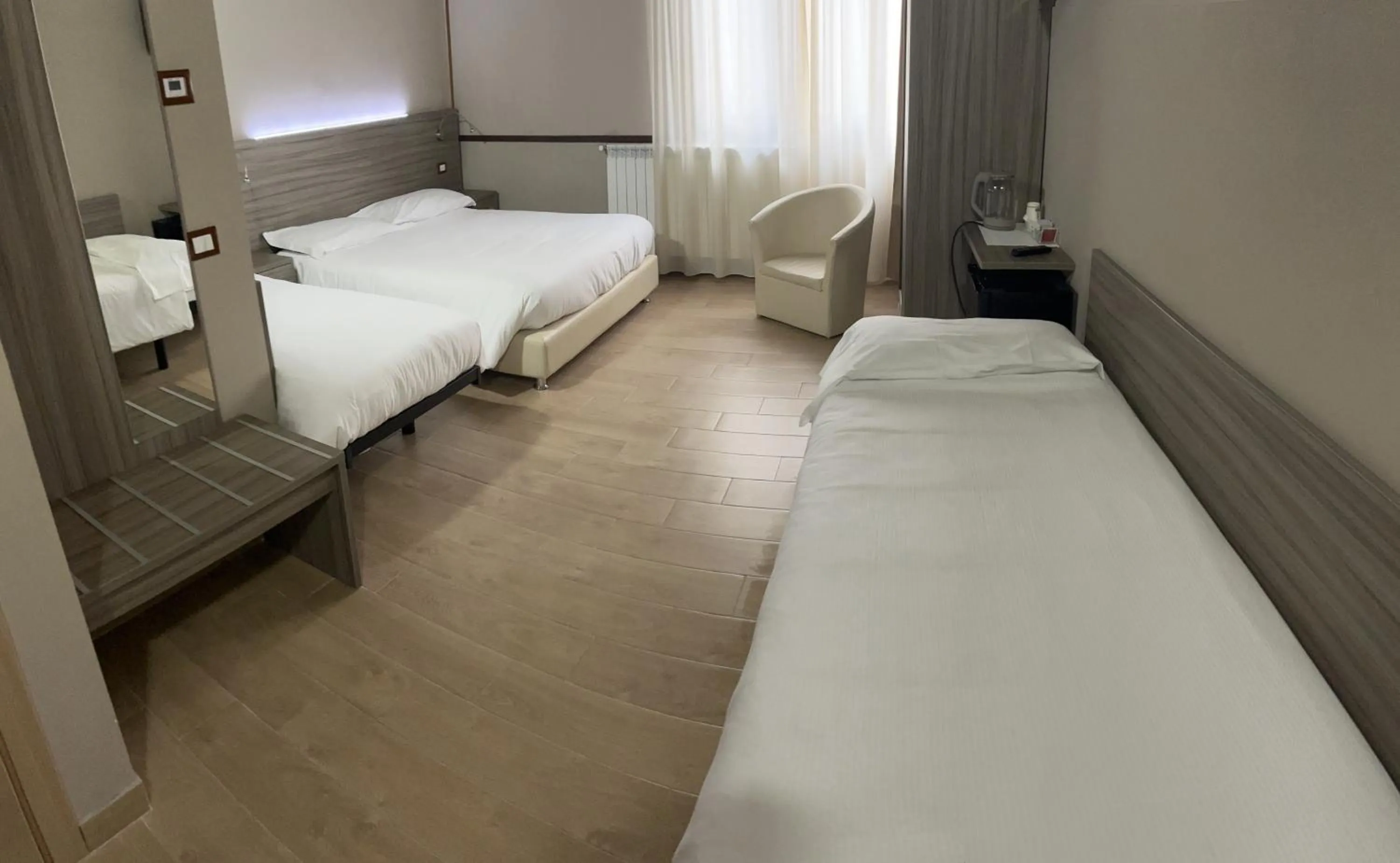 Photo of the whole room, Bed in La Capannina