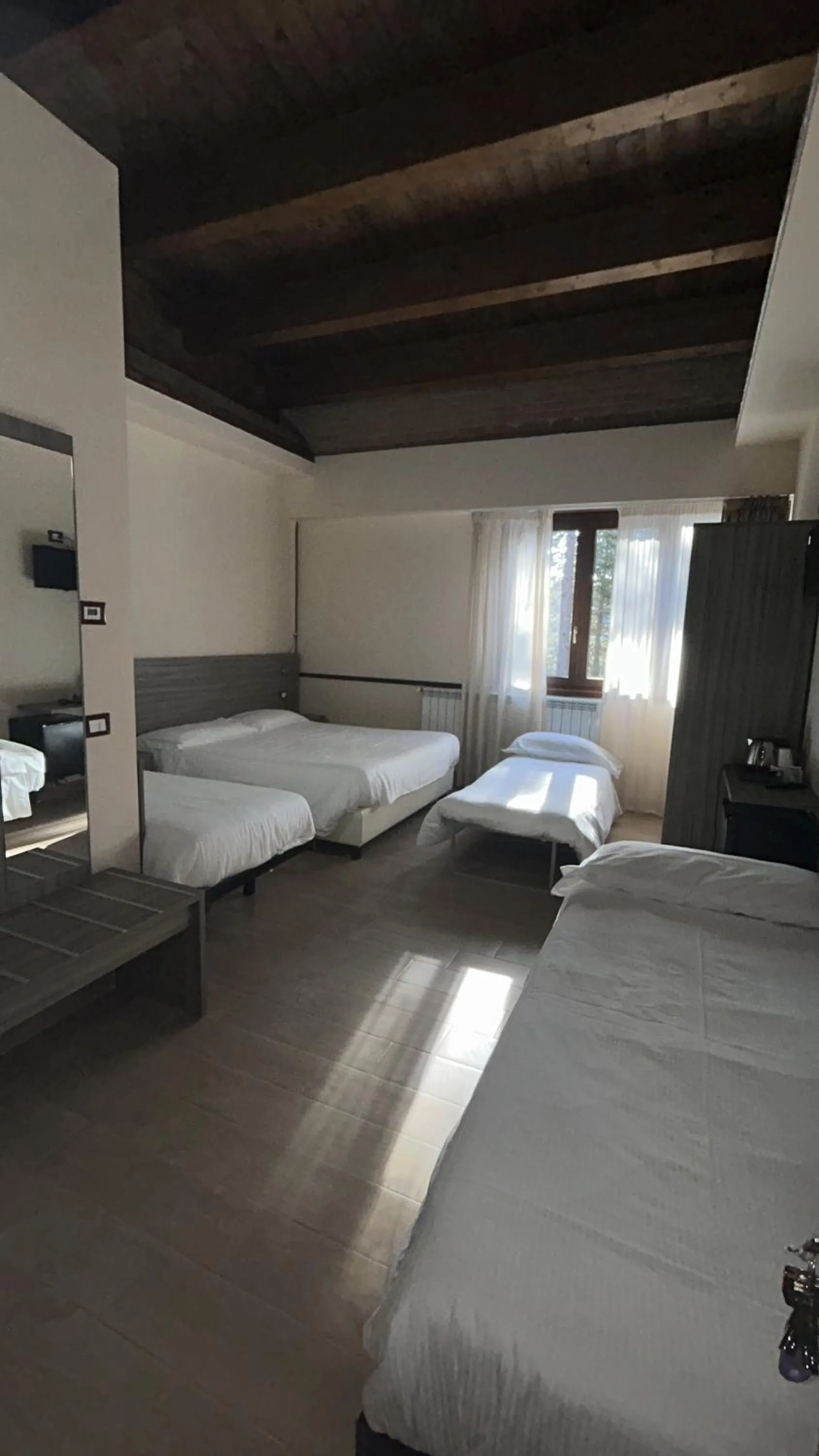 Photo of the whole room, Bed in La Capannina