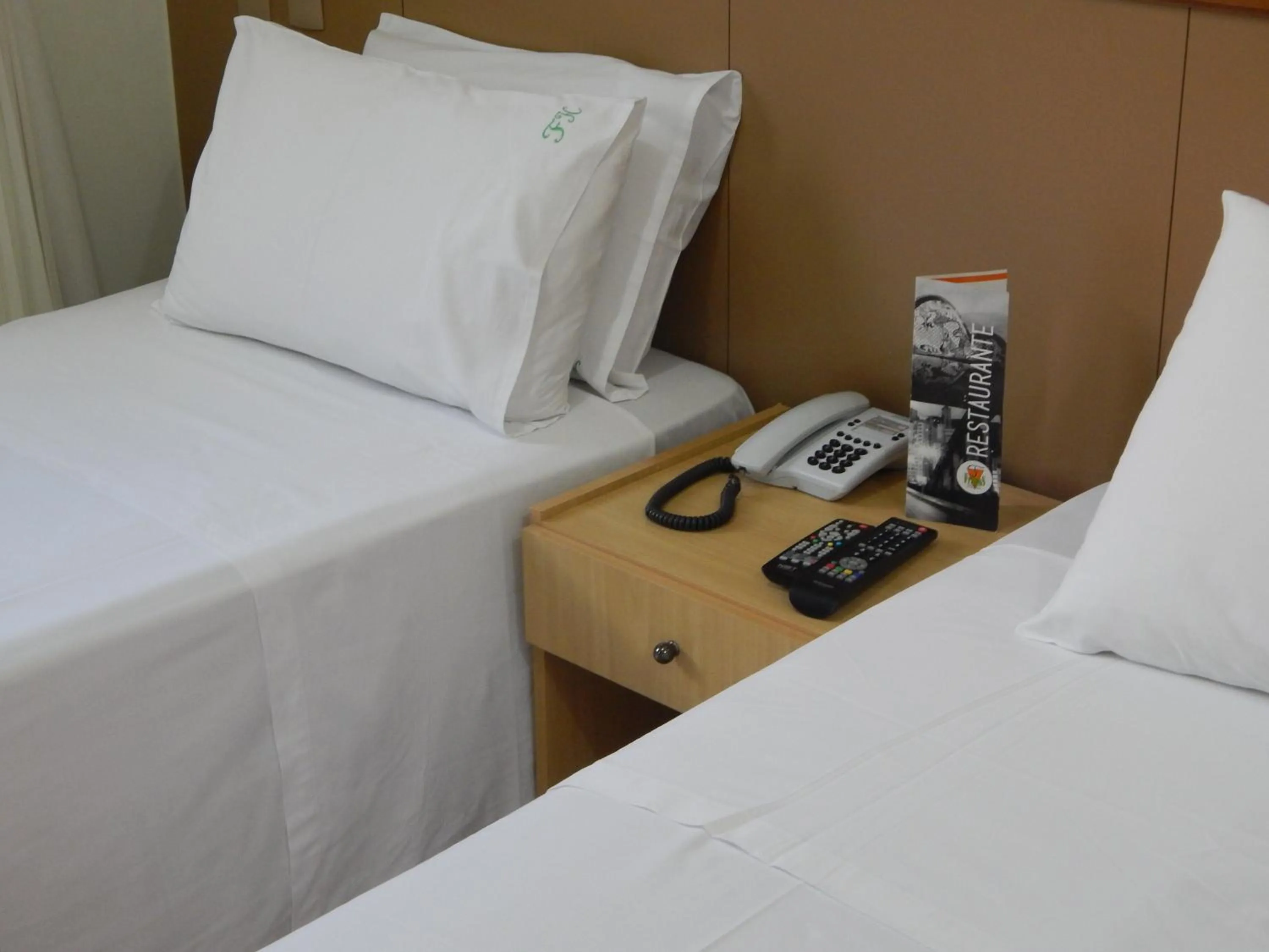 Bed in Frimas Hotel