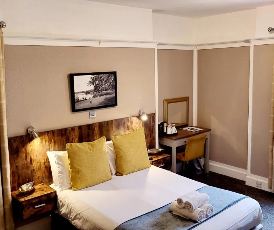 Bed in The Market Inn Hotel