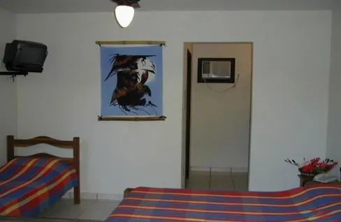Photo of the whole room, Bed in Pousada O Cantinho