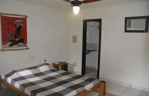 Photo of the whole room, Bed in Pousada O Cantinho