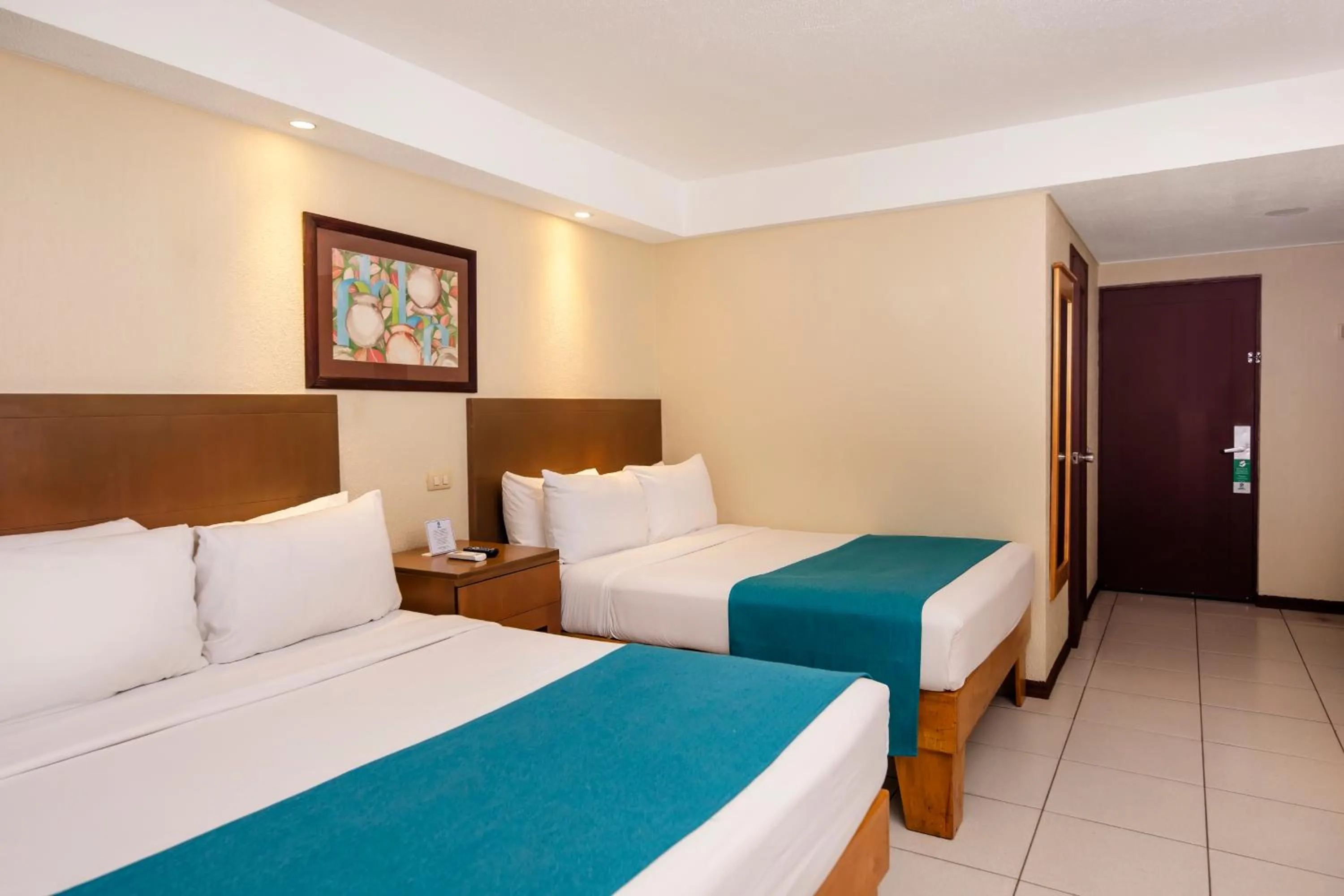 Bed in Best Western Jaco Beach All Inclusive Resort