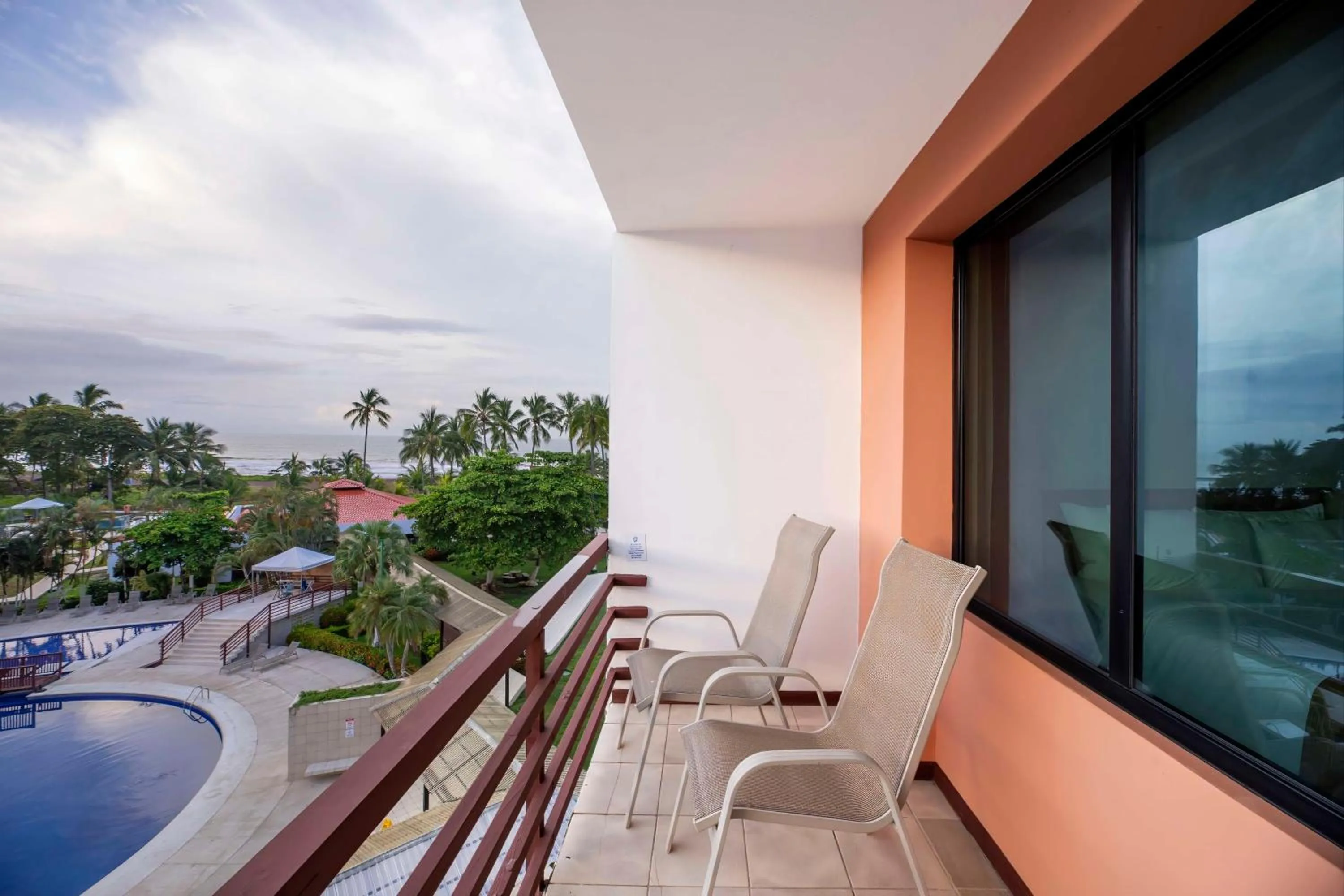 Bedroom in Best Western Jaco Beach All Inclusive Resort