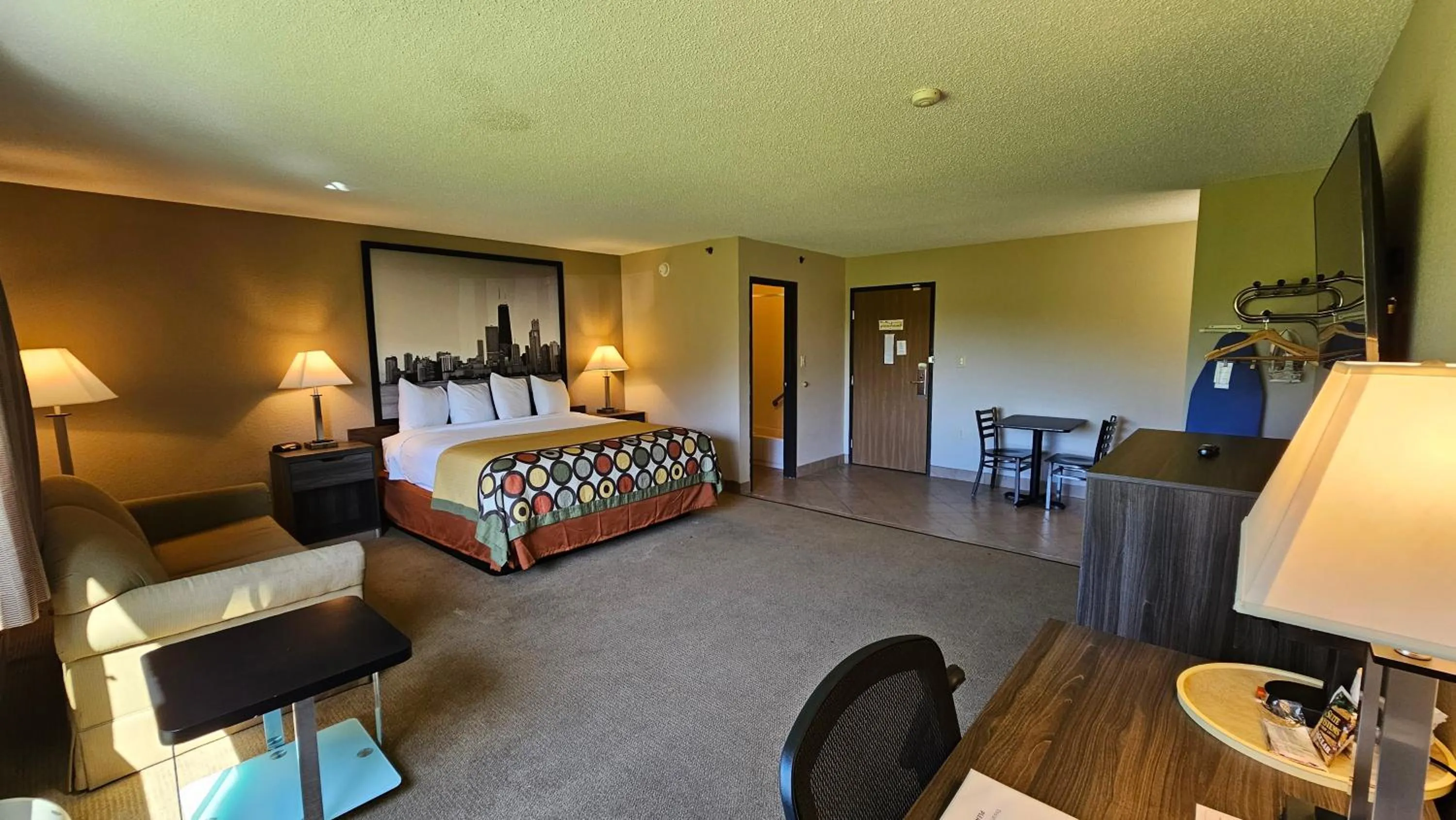 Communal lounge/ TV room, Bed in Super 8 by Wyndham Elgin