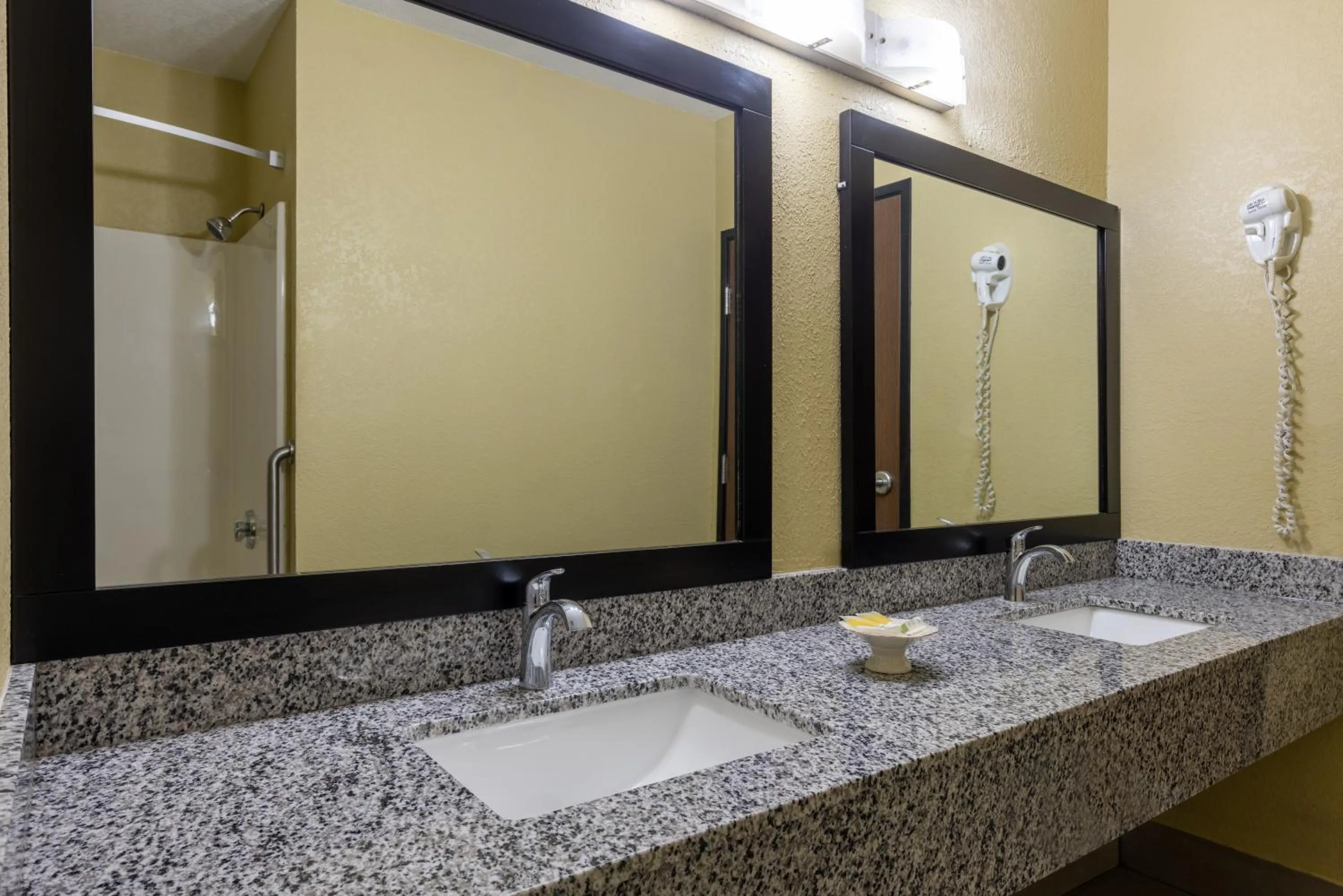 Bathroom in Super 8 by Wyndham Nixa/Springfield Area