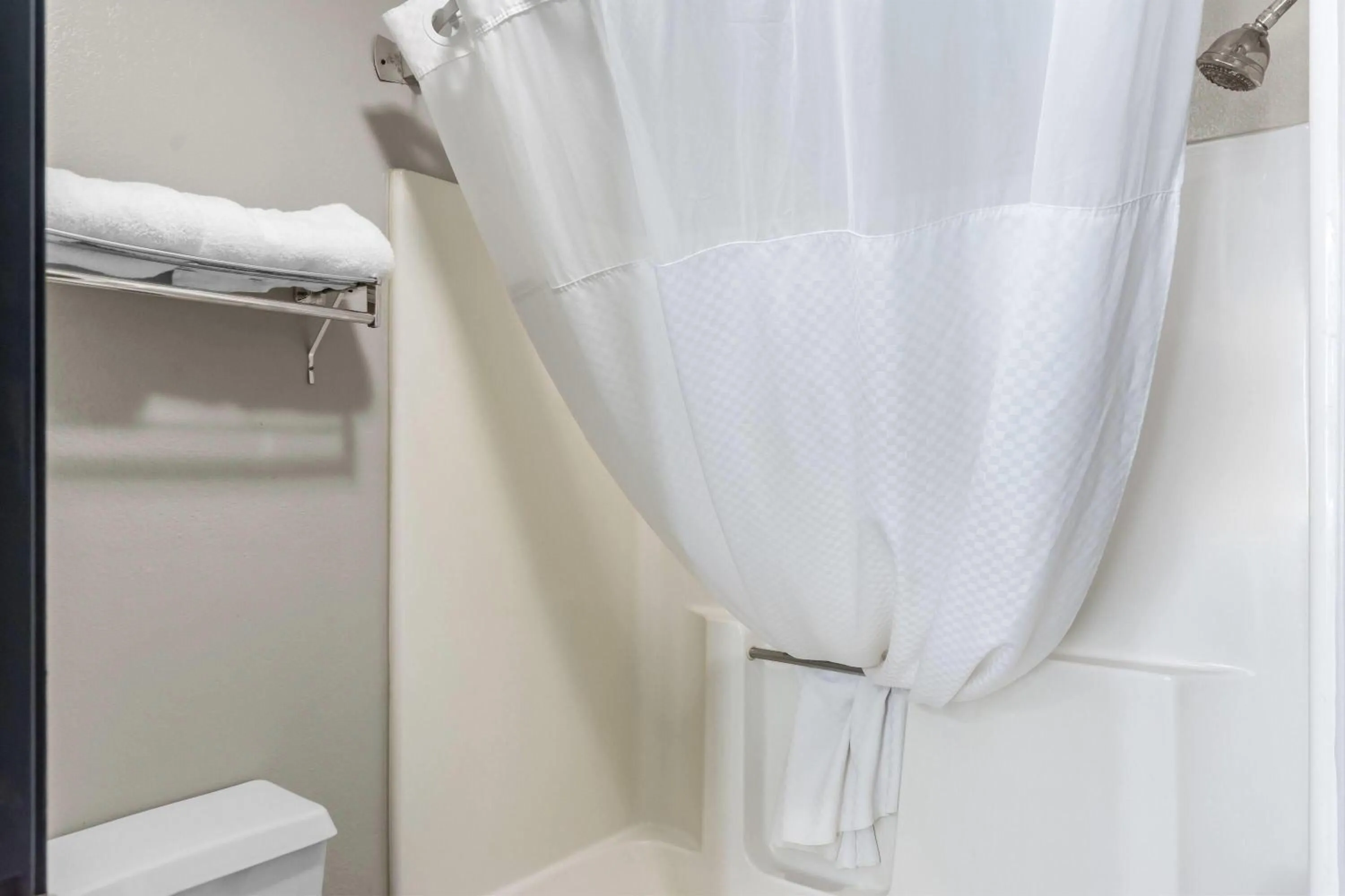 Bathroom in Super 8 by Wyndham Evansville East