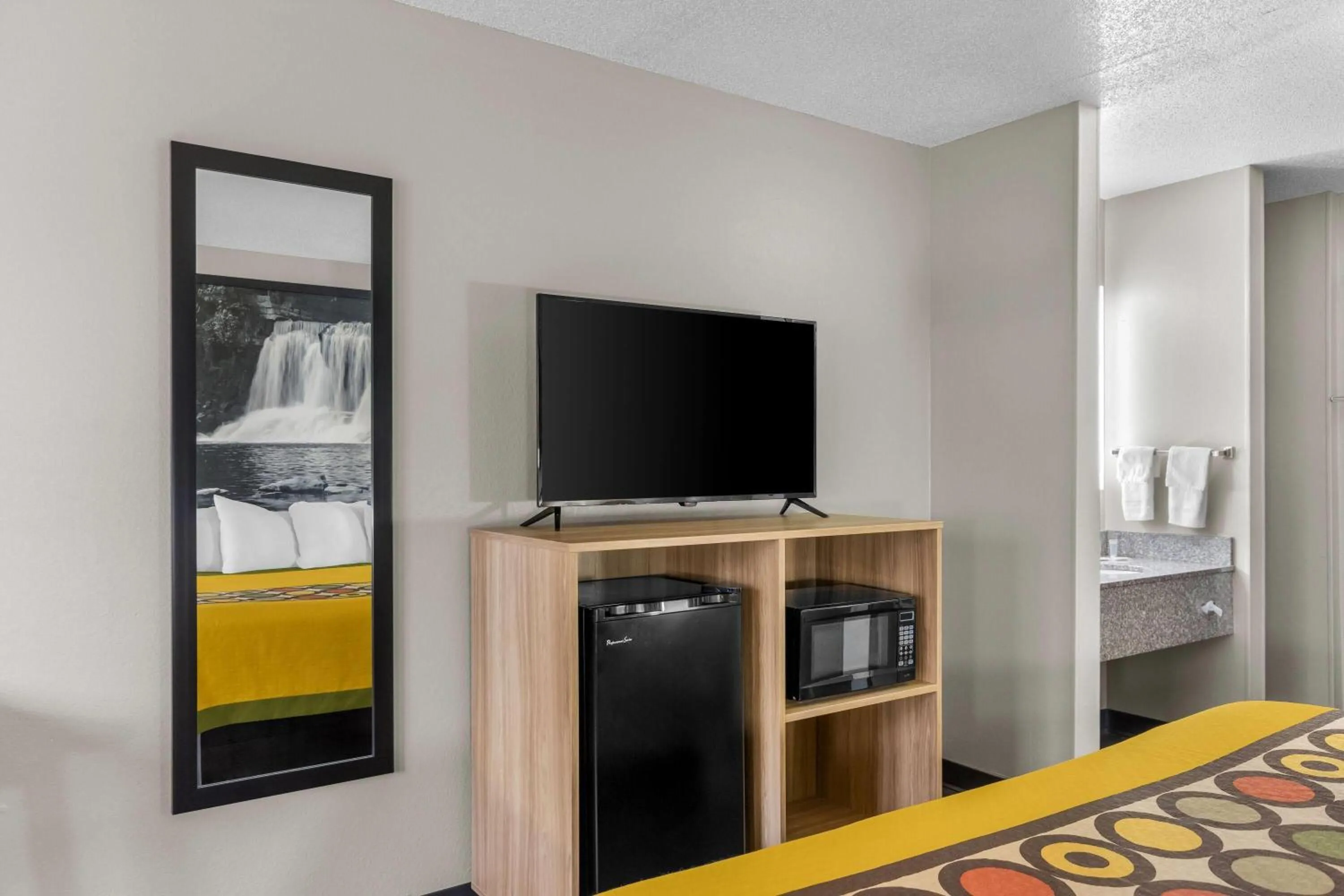 Bed in Super 8 by Wyndham Evansville East