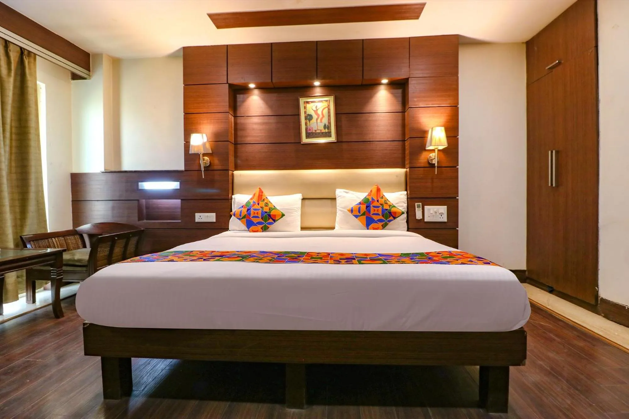 Bed in FabHotel Admire Suites