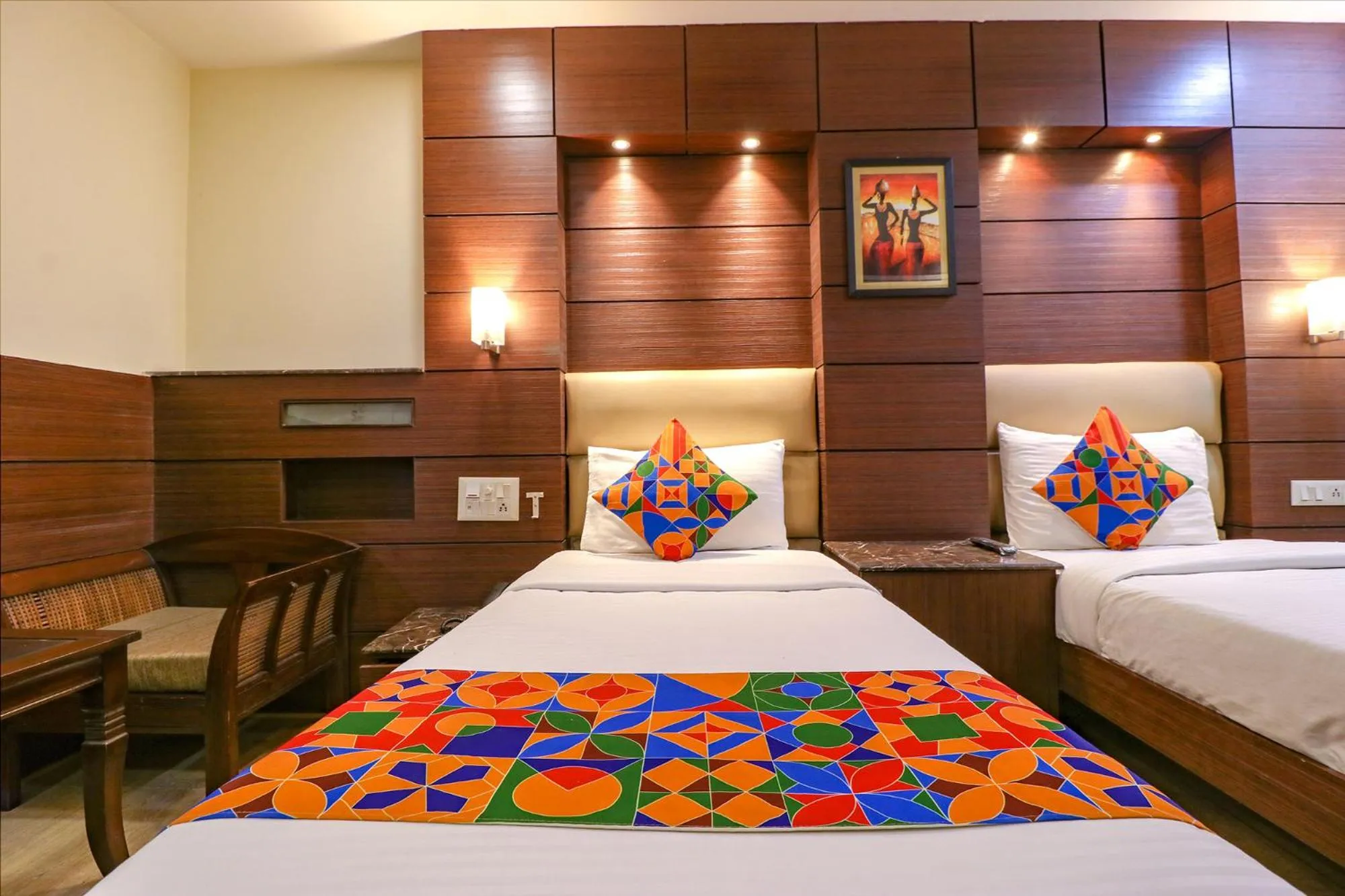 Bed in FabHotel Admire Suites