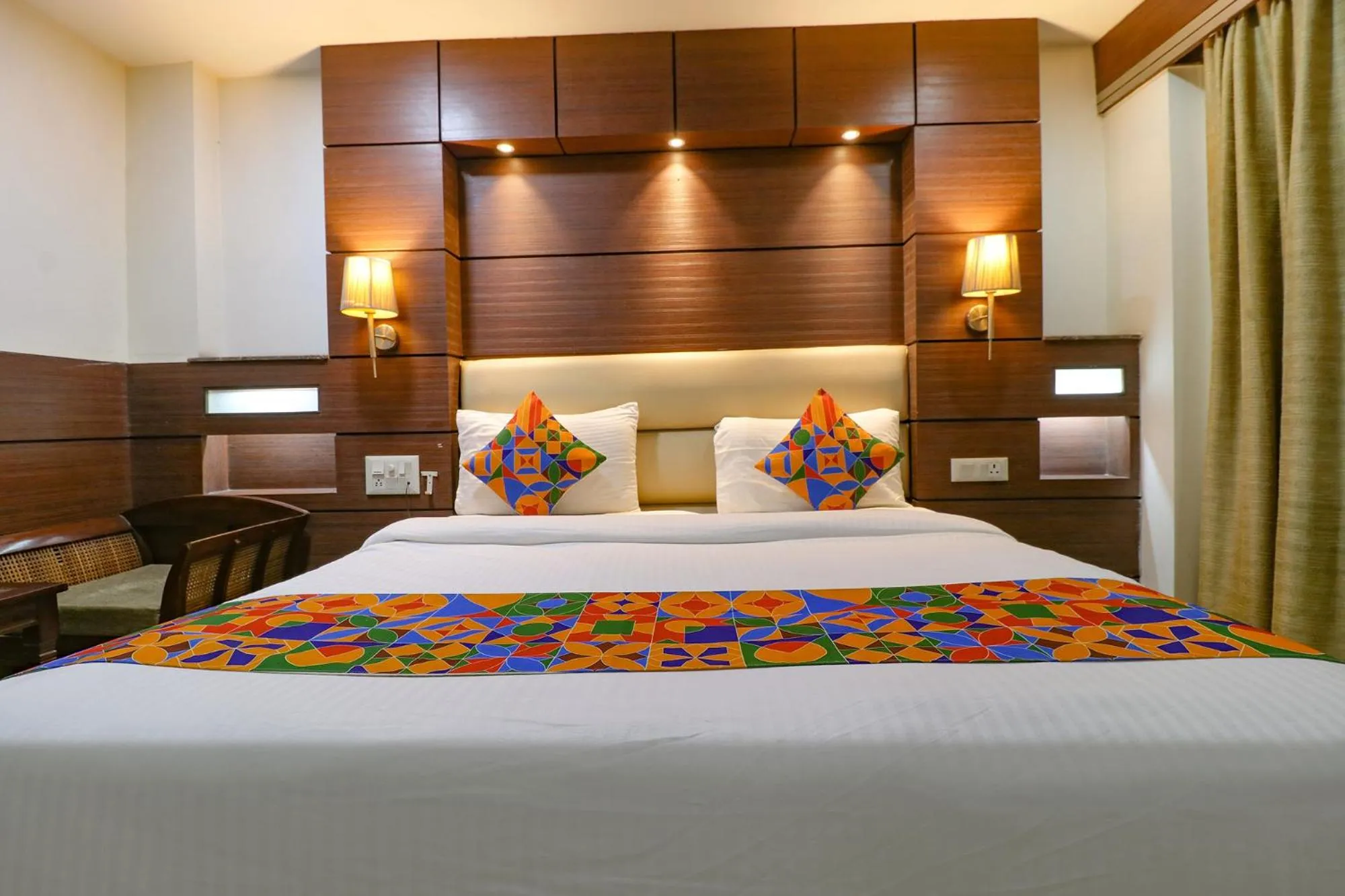 Bed in FabHotel Admire Suites