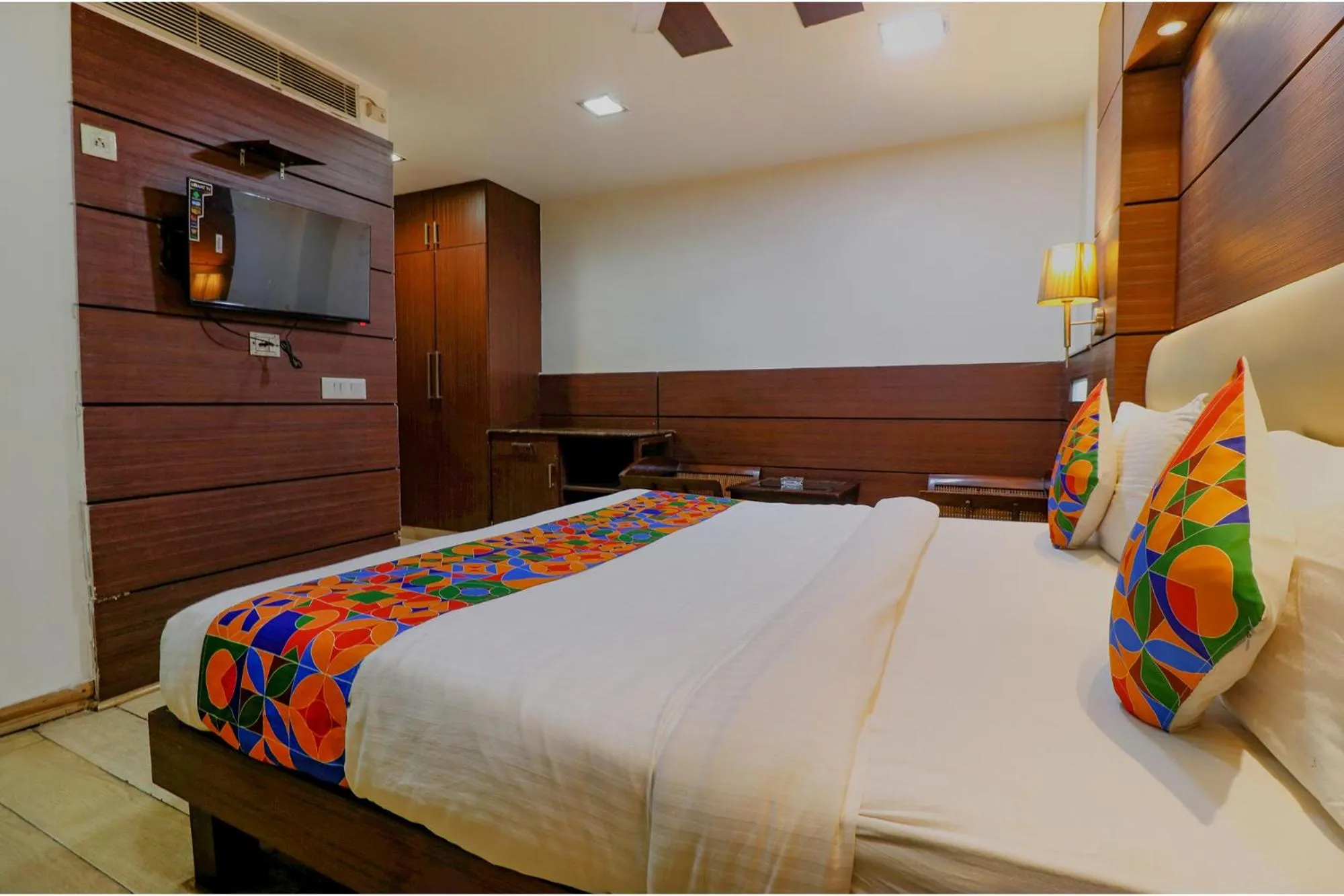 Bed in FabHotel Admire Suites