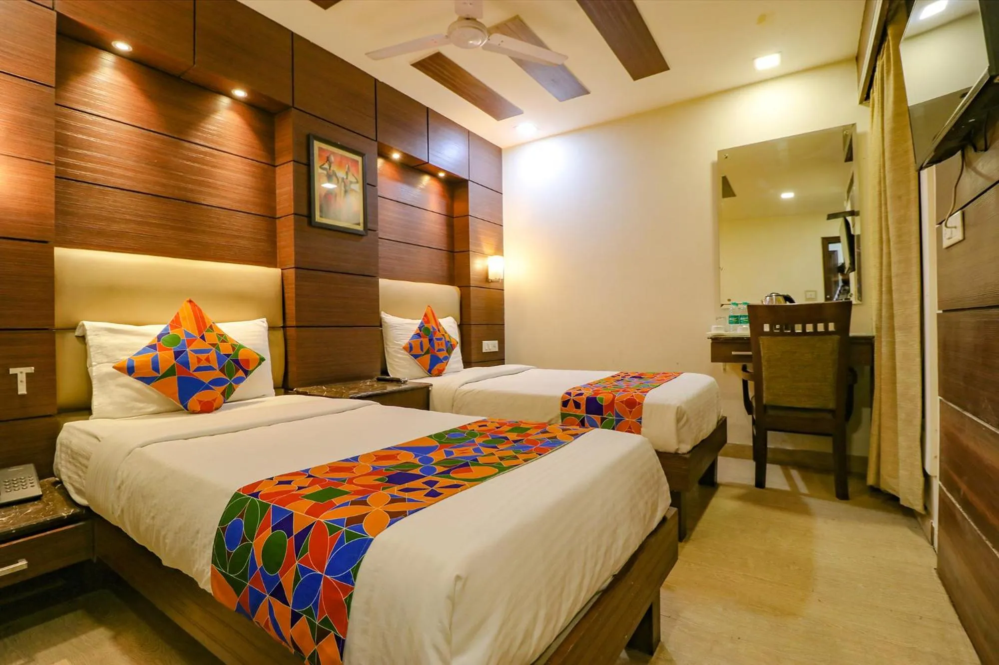 Bed in FabHotel Admire Suites