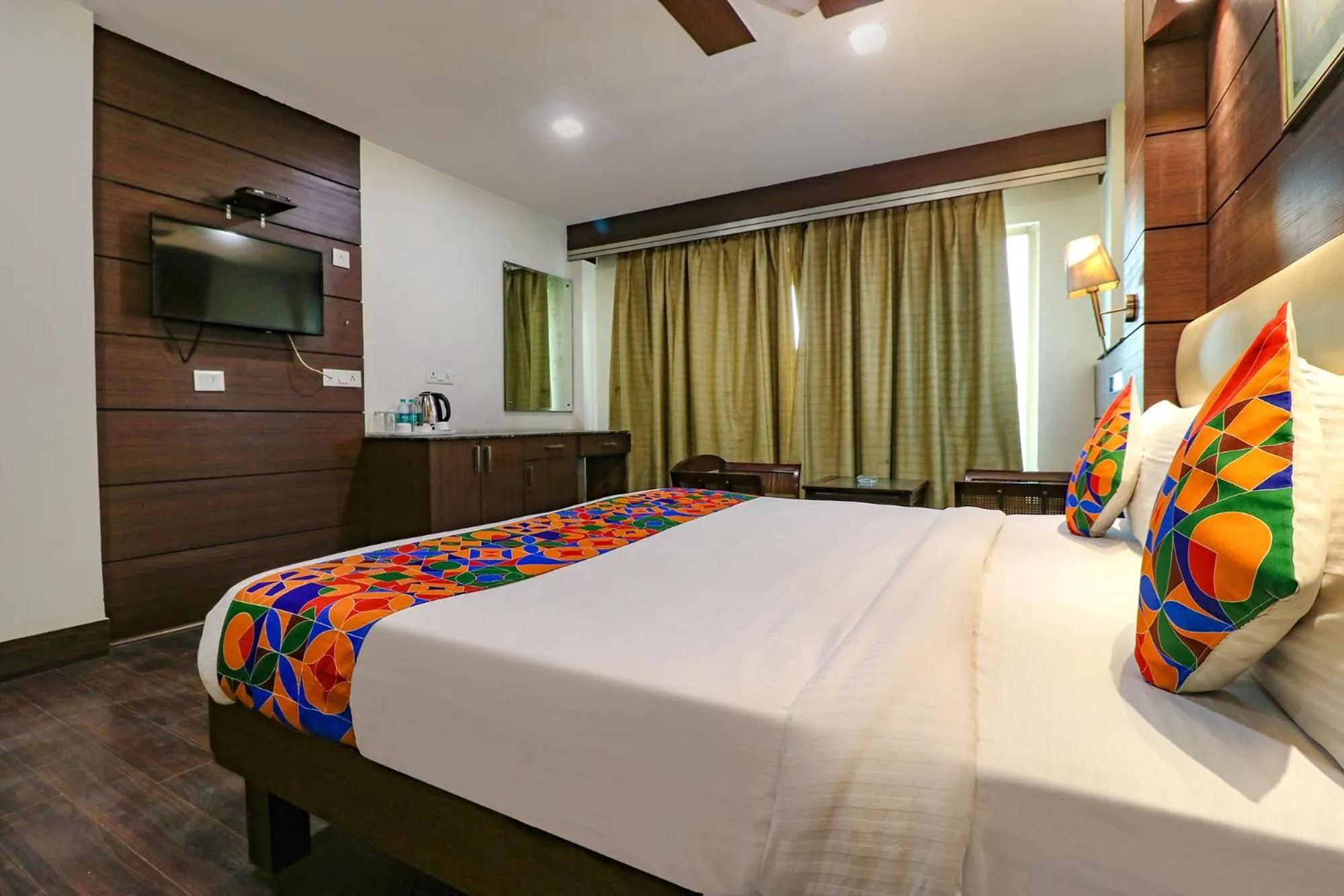 Bed in FabHotel Admire Suites