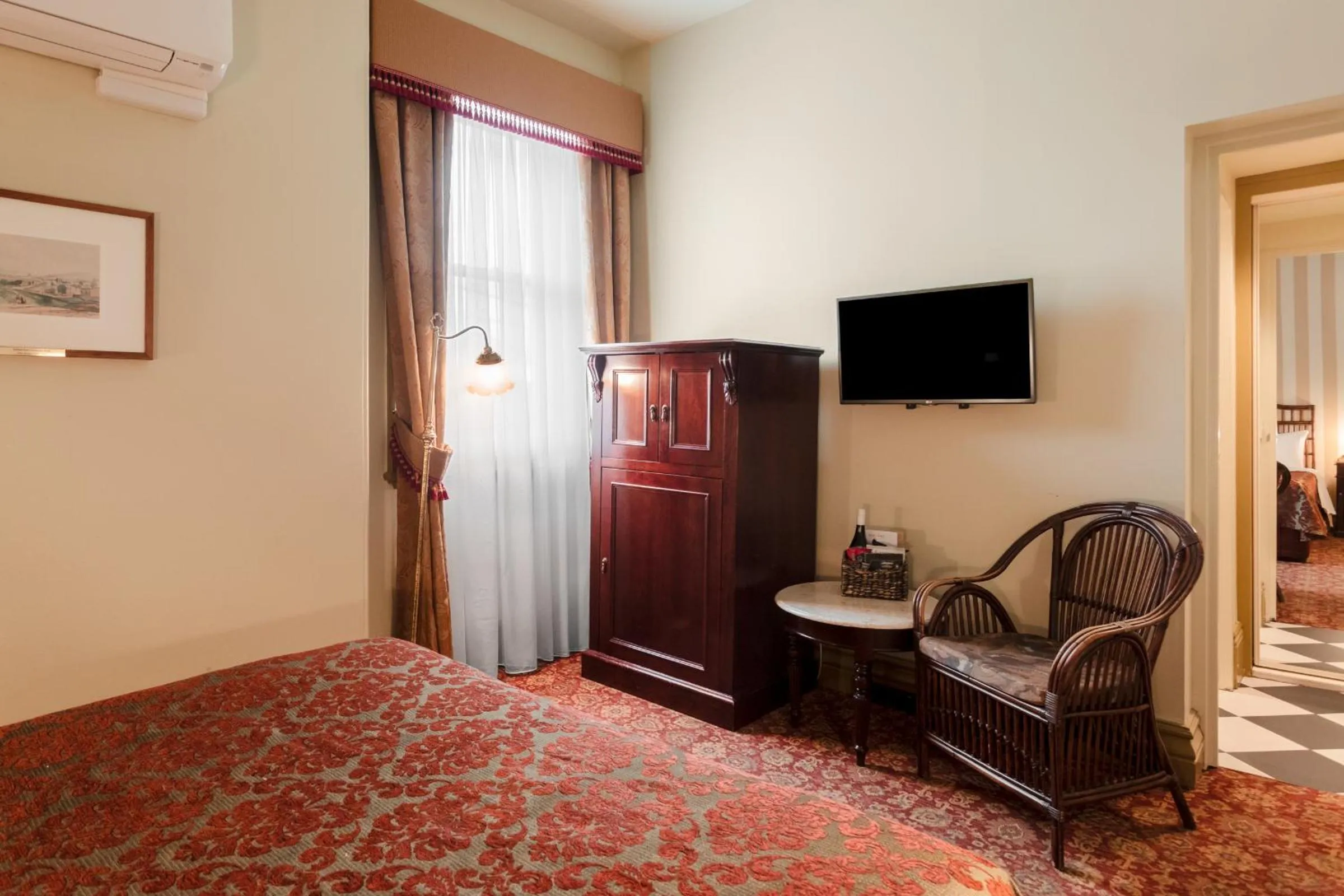 Bed in Hadley's Orient Hotel