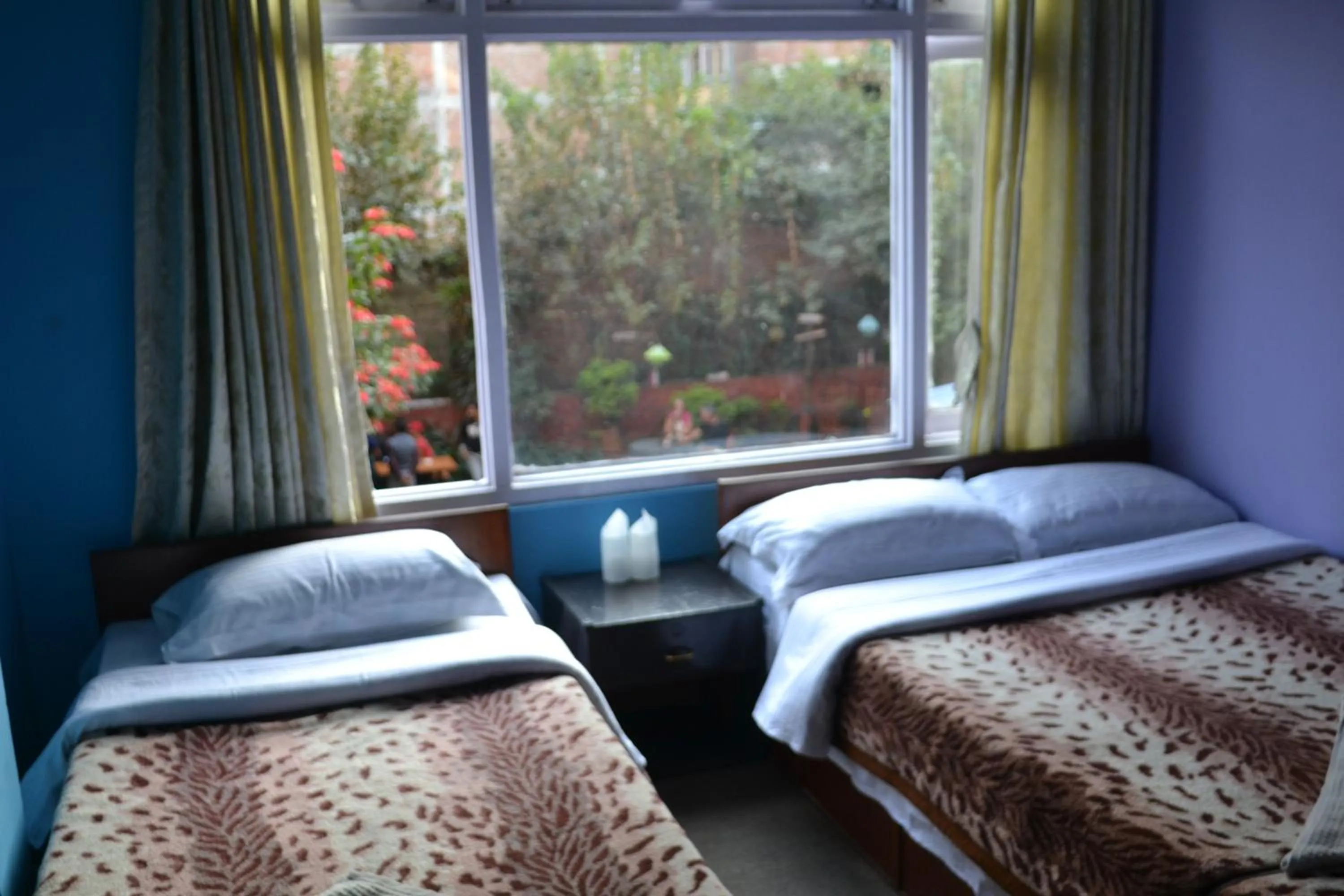 Bed in Hotel Discovery Inn