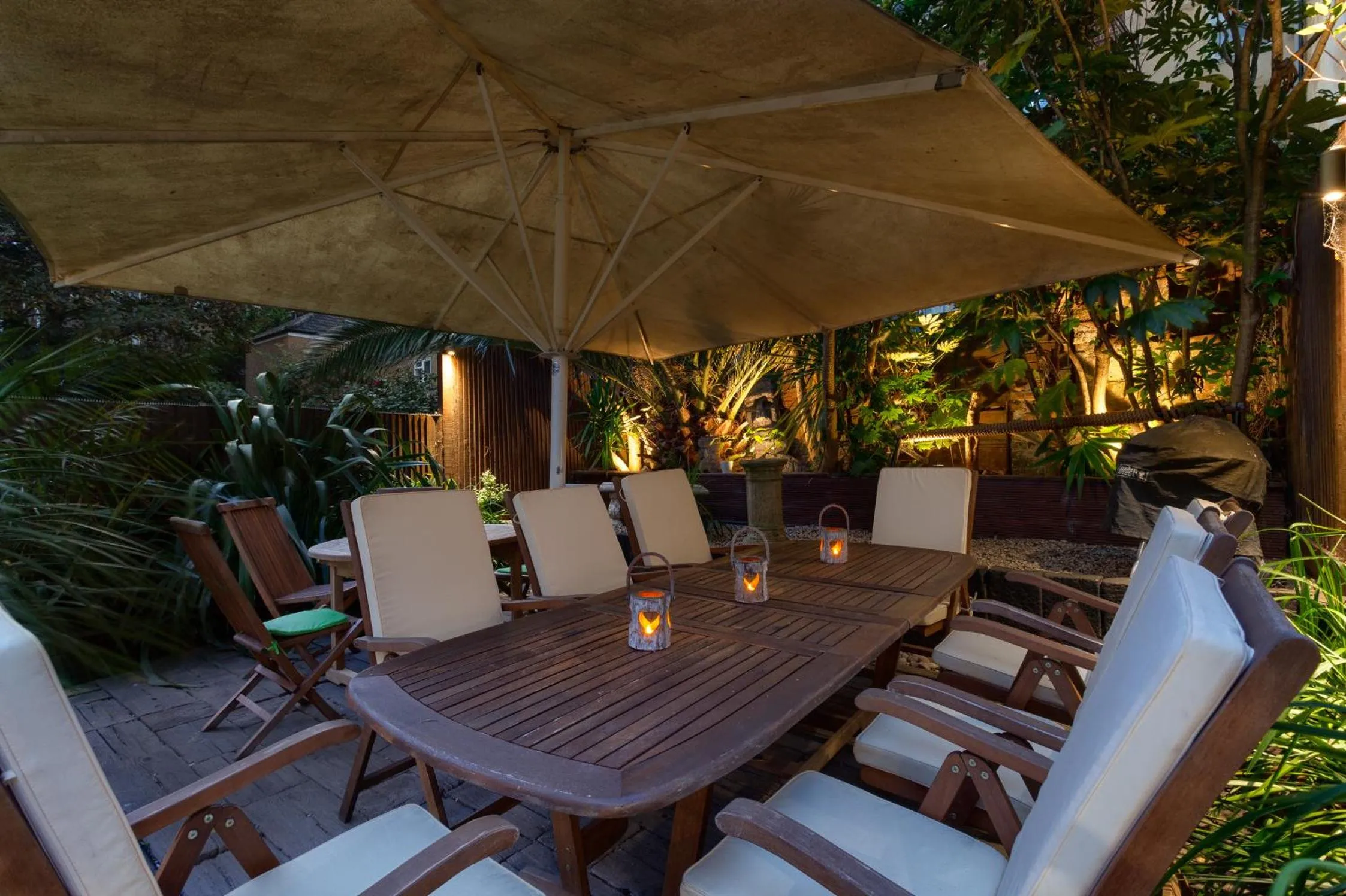 Patio in Zanzibar House 8-Bedroom Holiday House with Hot Tub & Yoga Studio