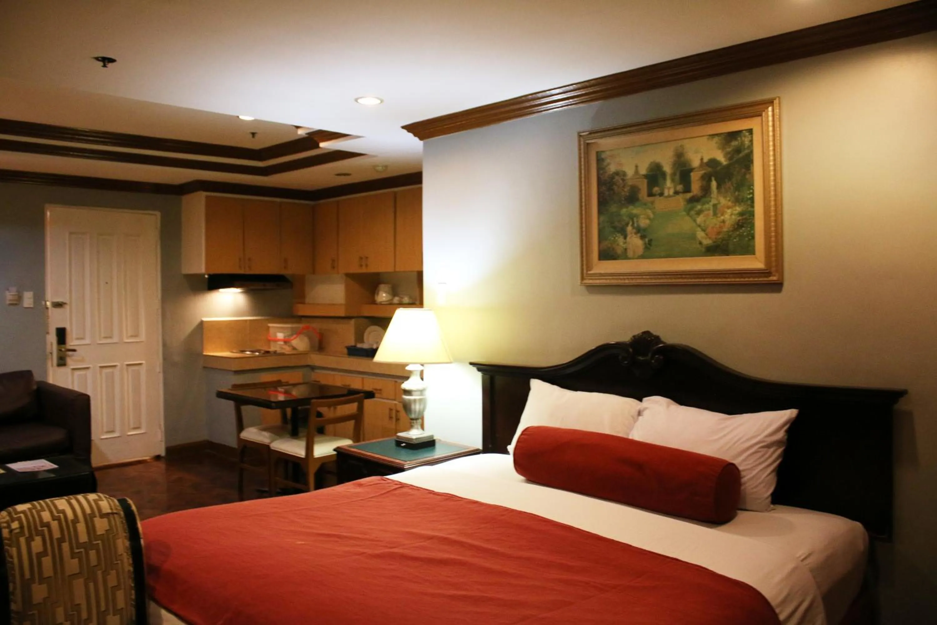 Bed in Lourdes Family Suites Makati powered by Cocotel