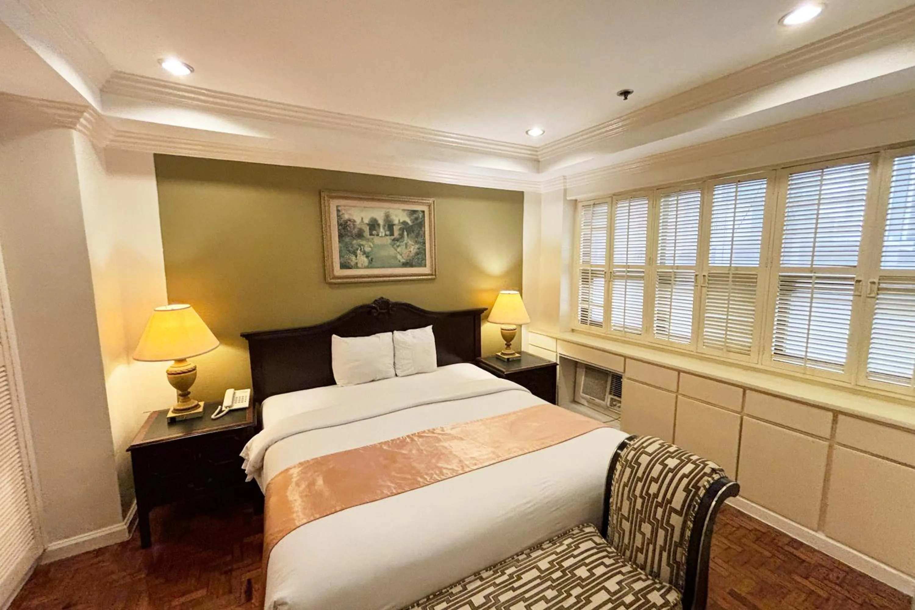 Bed in Lourdes Family Suites Makati powered by Cocotel