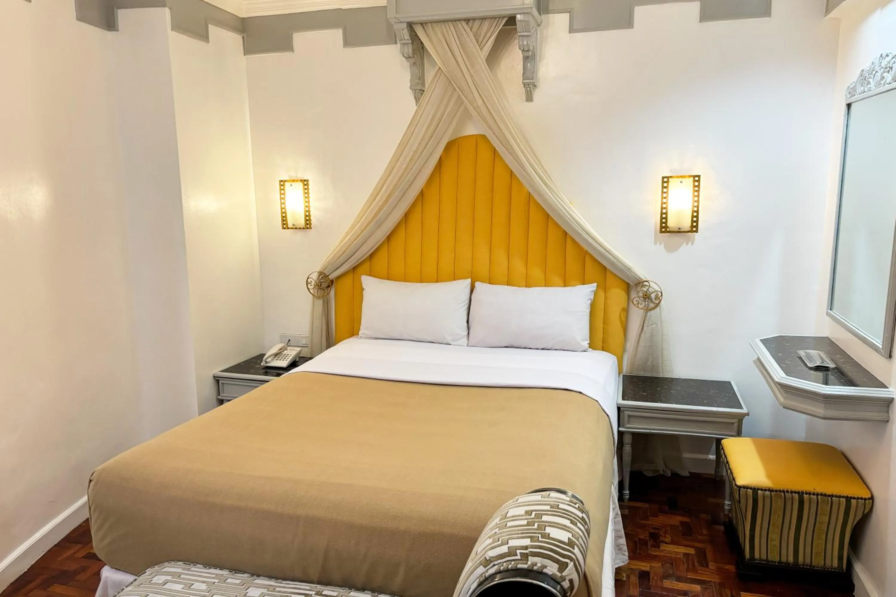 Bed in Camelot Hotel Quezon City powered by Cocotel