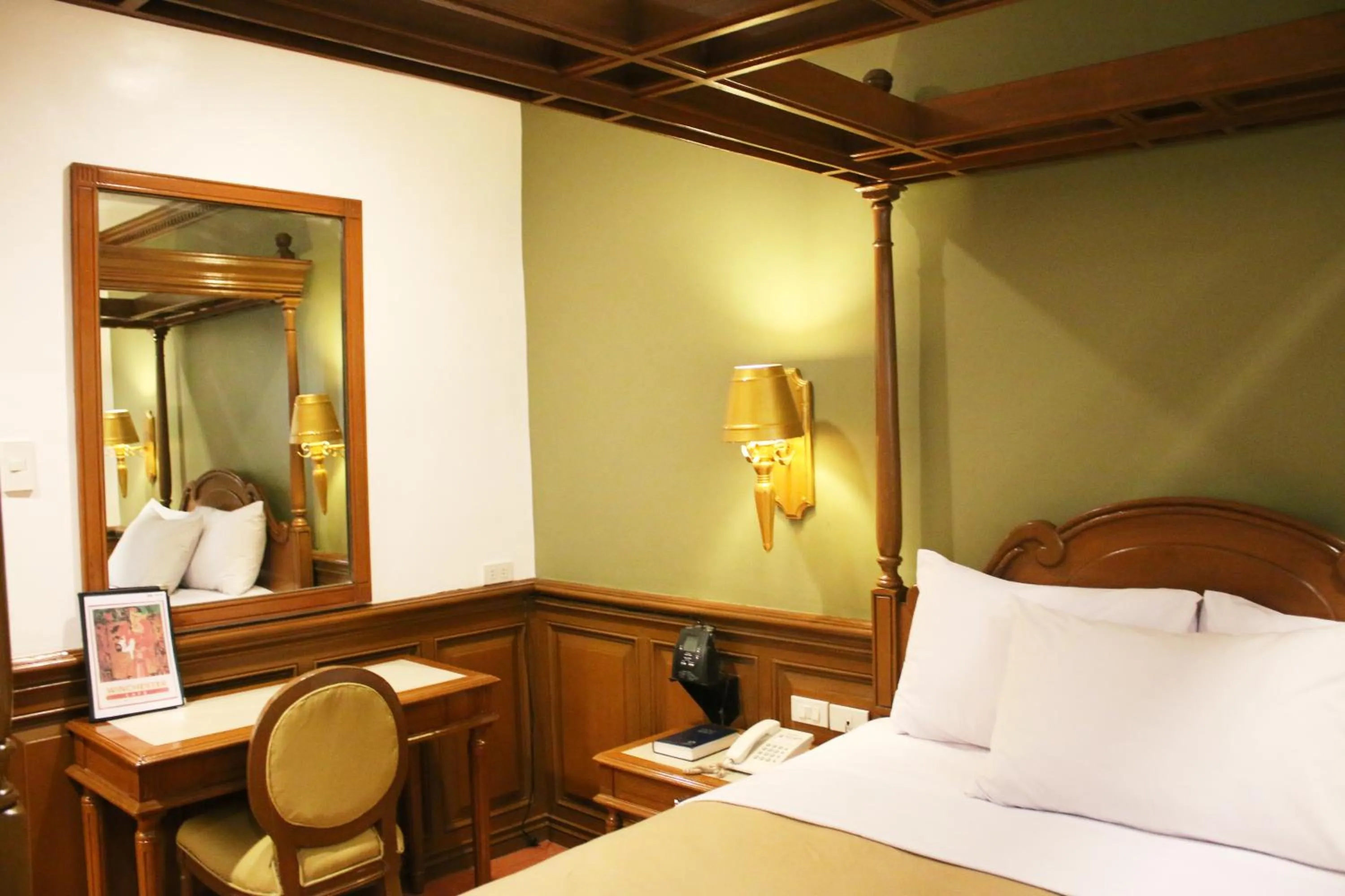 Bed in Camelot Hotel Quezon City powered by Cocotel