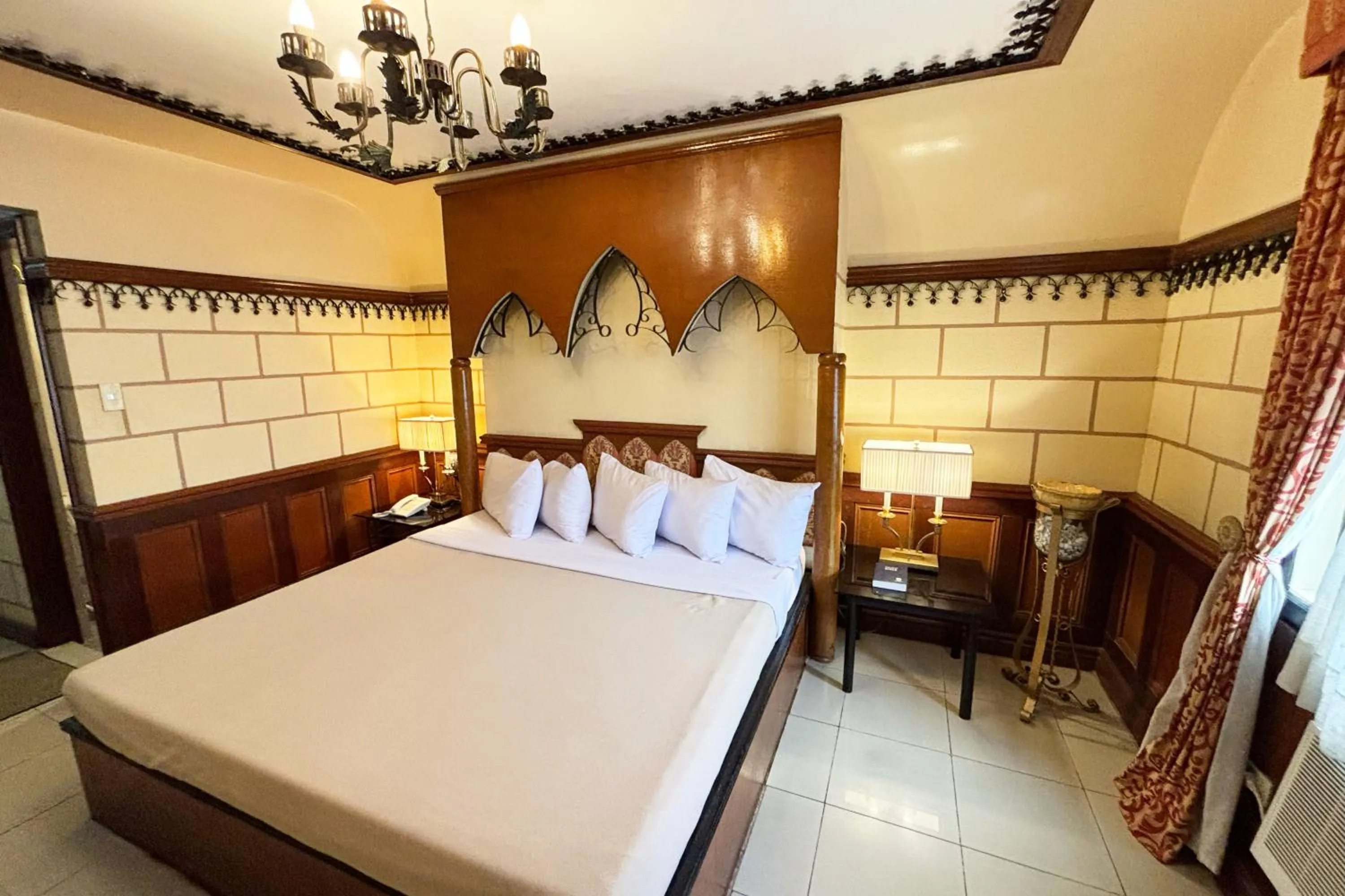 Bed in Camelot Hotel Quezon City powered by Cocotel