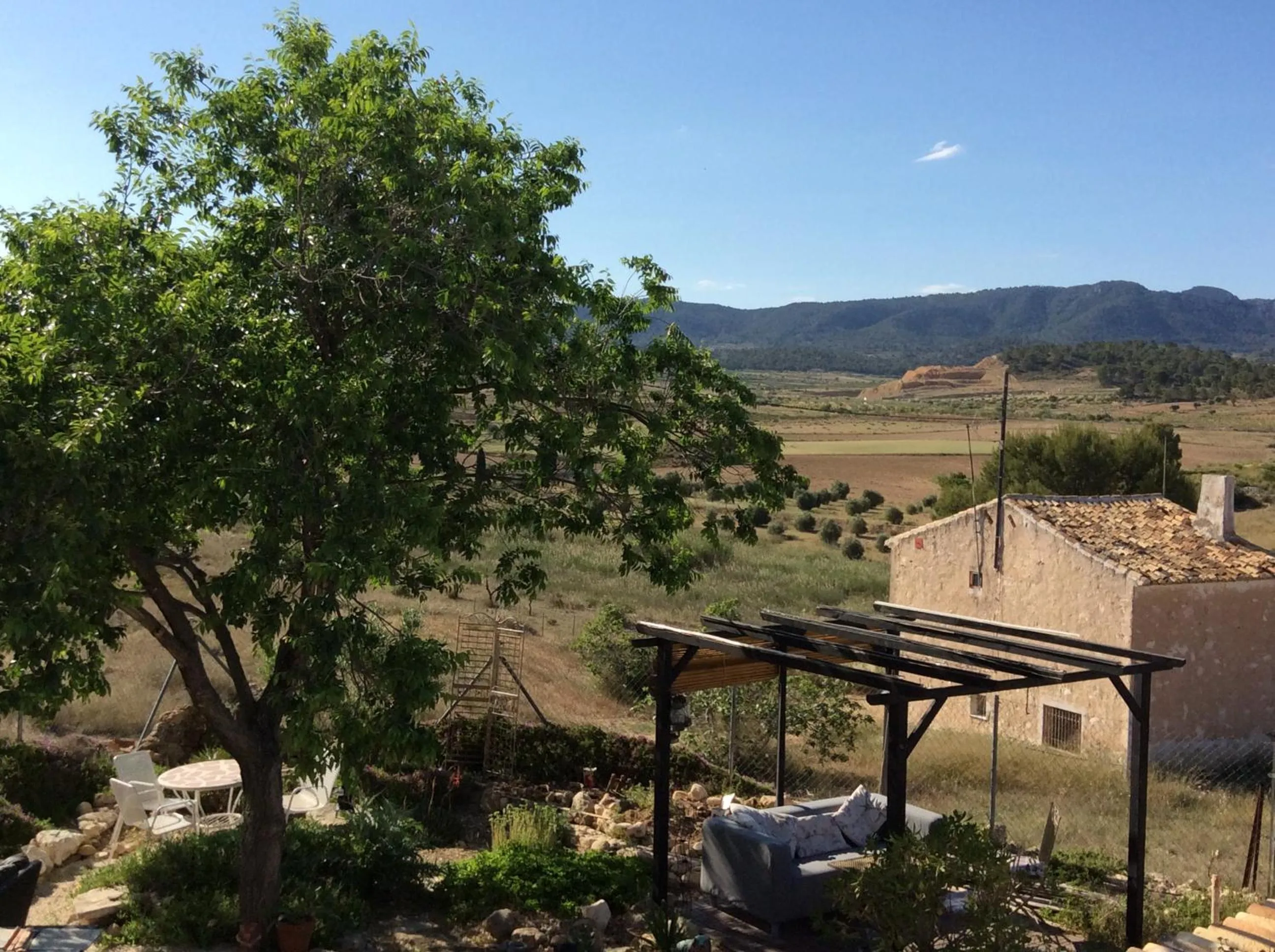 Property building in Los Cuatro Vientos B&B