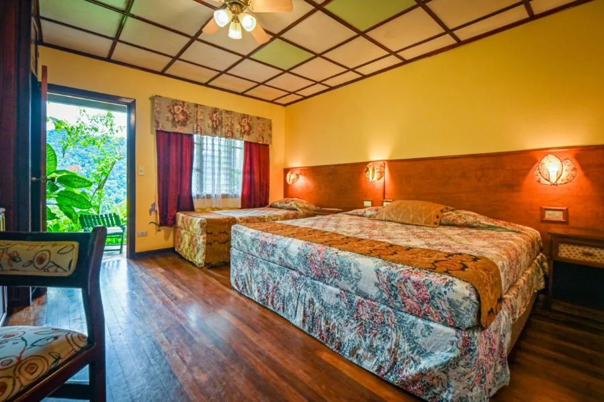 Bedroom, Bed in Lands in Love Hotel and Resort