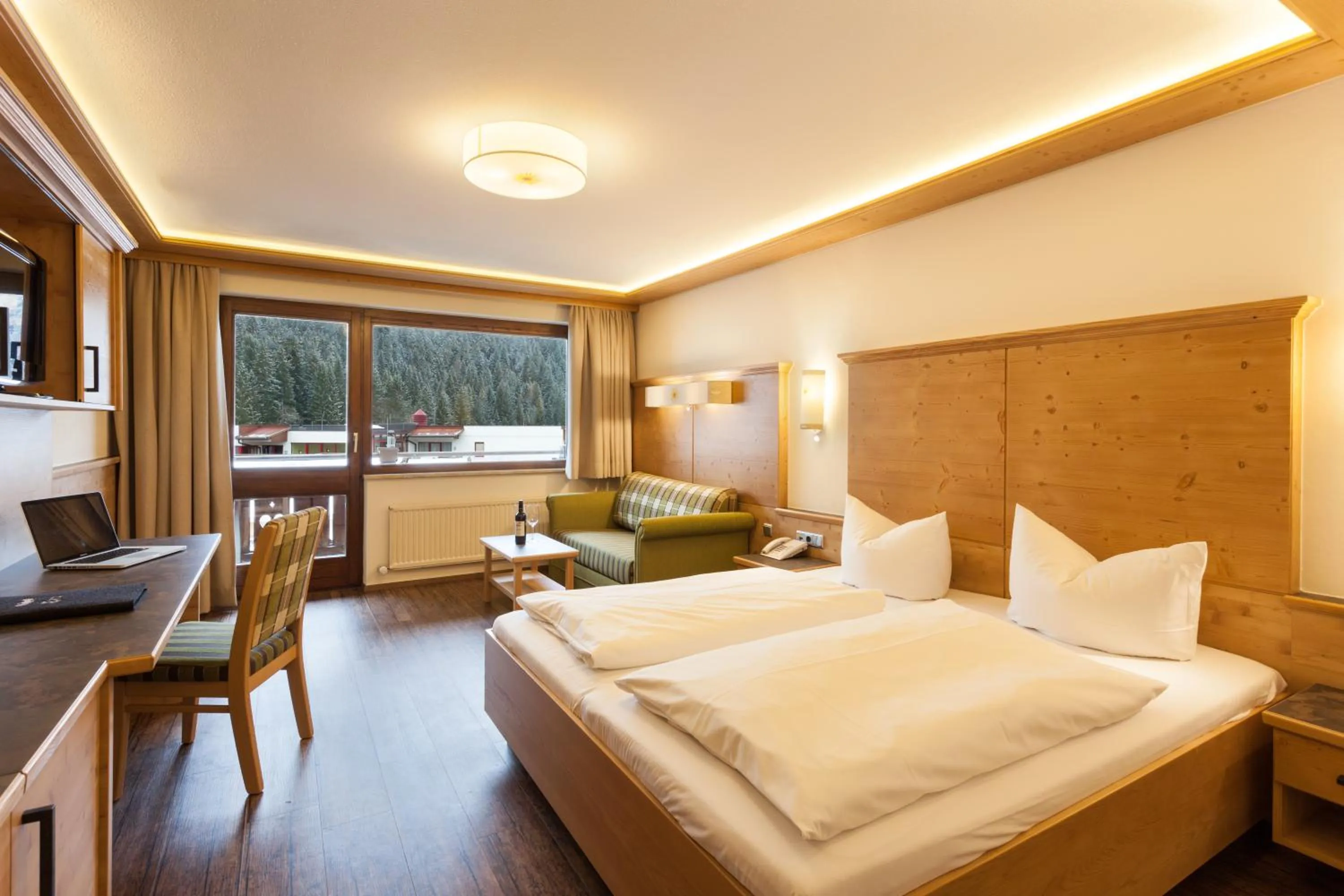 Photo of the whole room, Bed in Hotel Tyrol am Haldensee