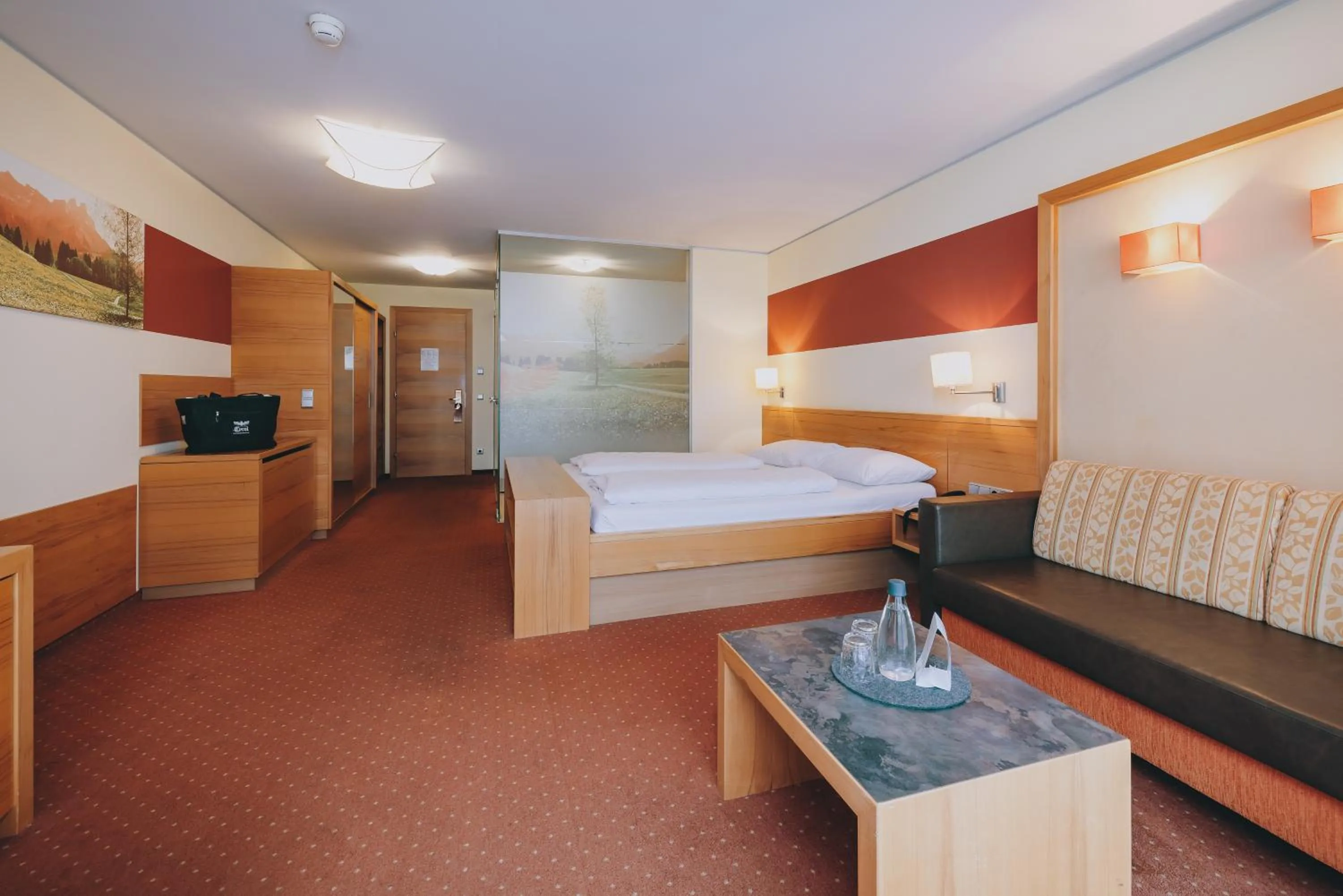 Photo of the whole room, Bed in Hotel Tyrol am Haldensee