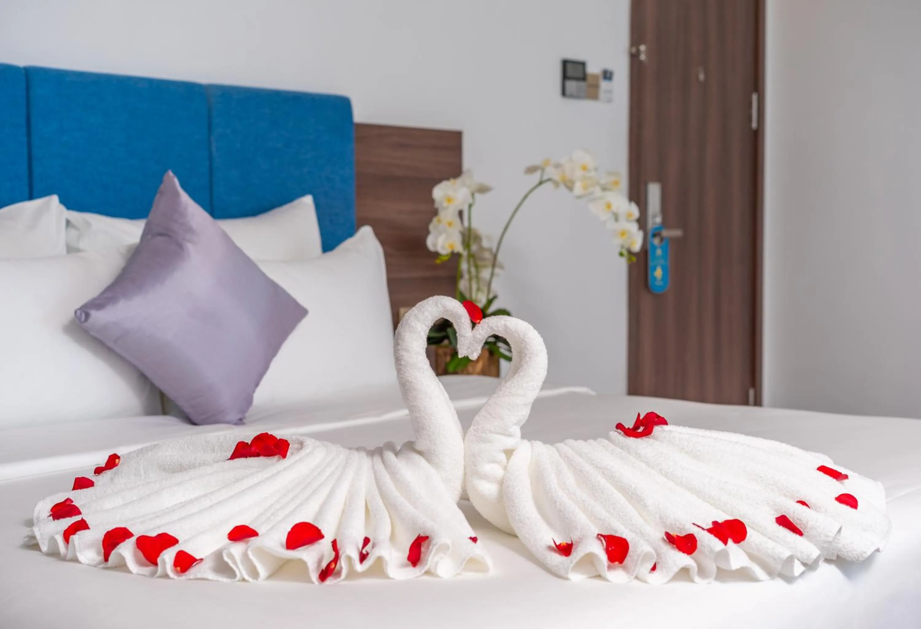 Bed in Grand Gold Hotel