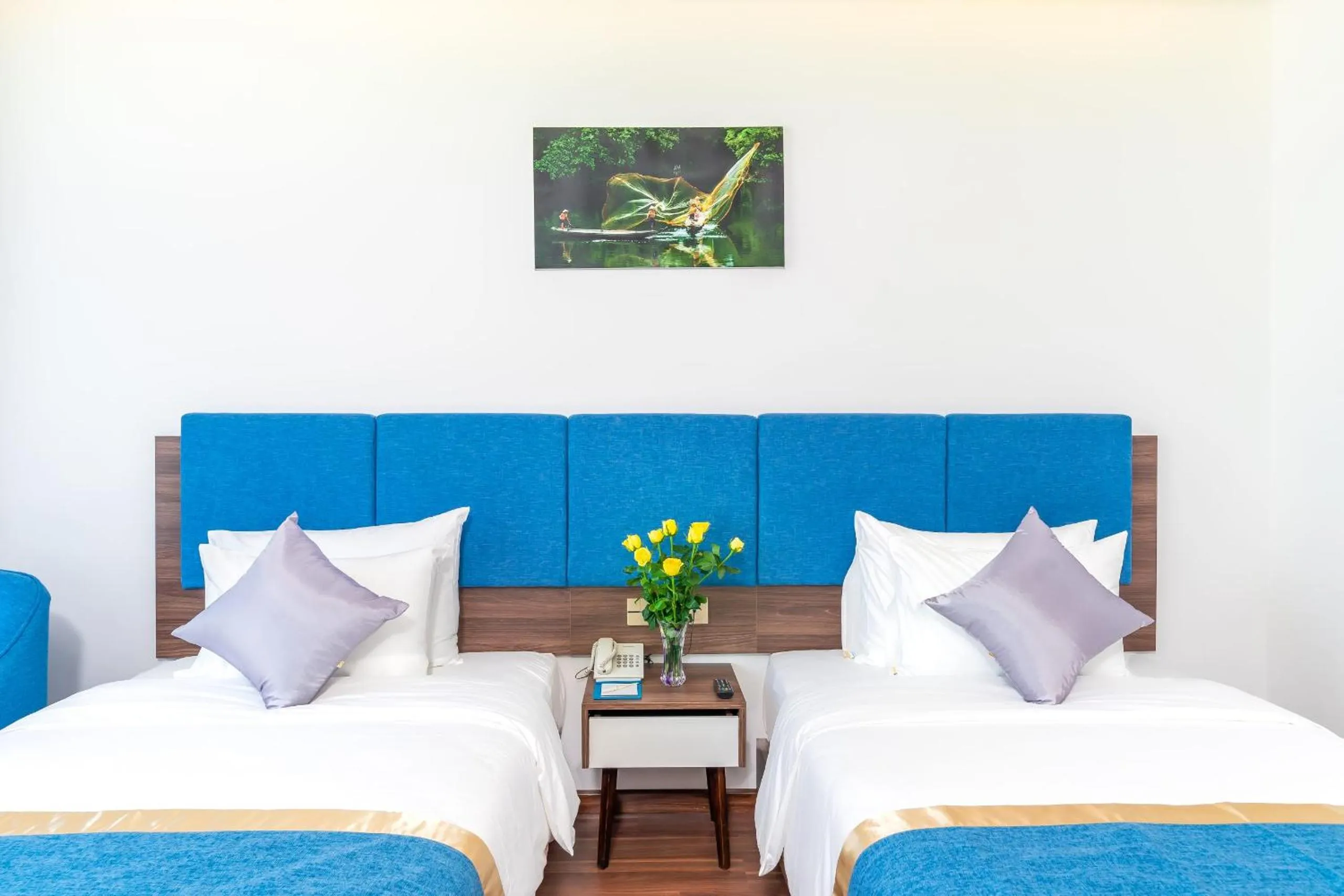 Bed in Grand Gold Hotel