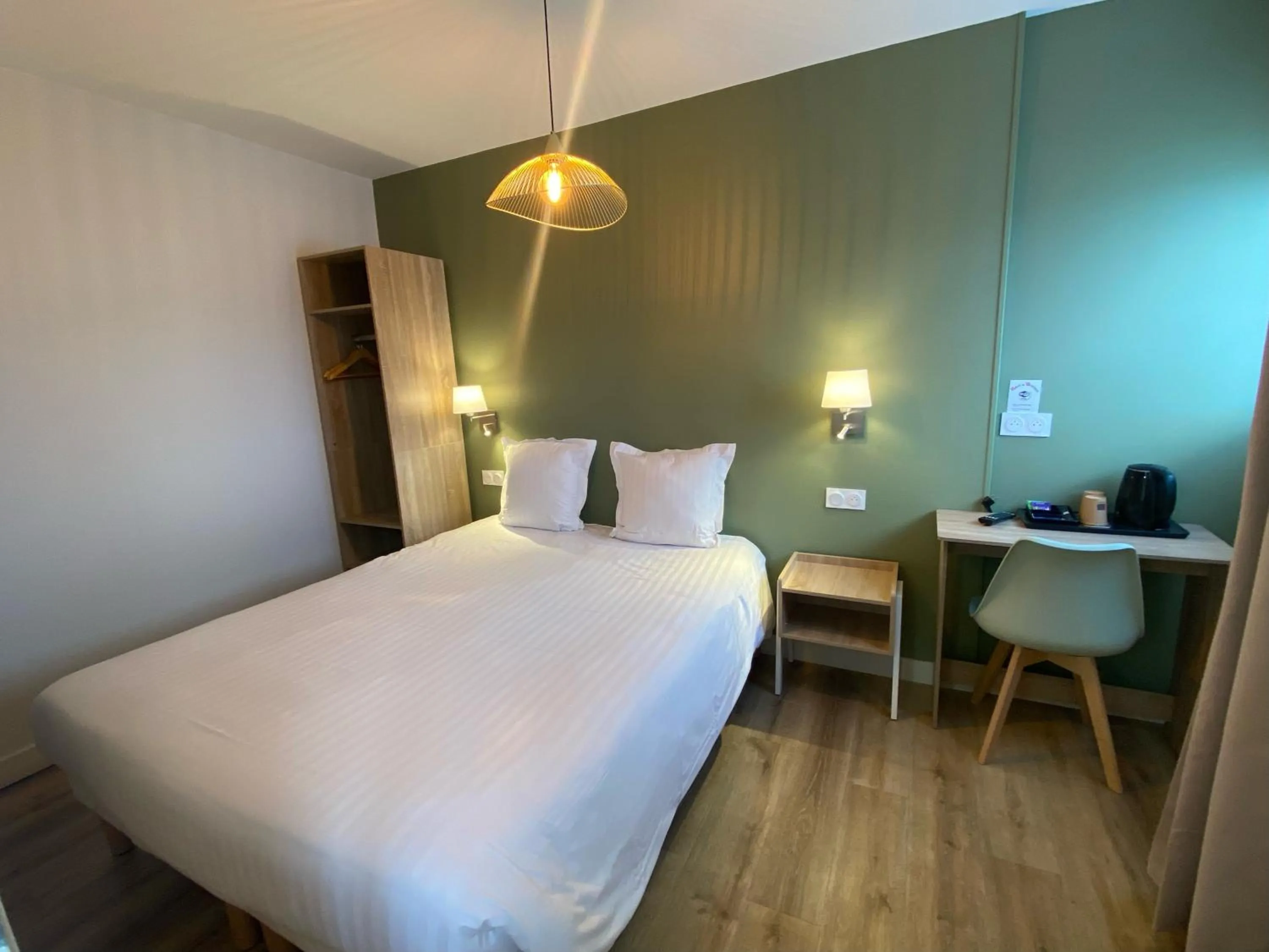 Bed in Hotel de Bretagne