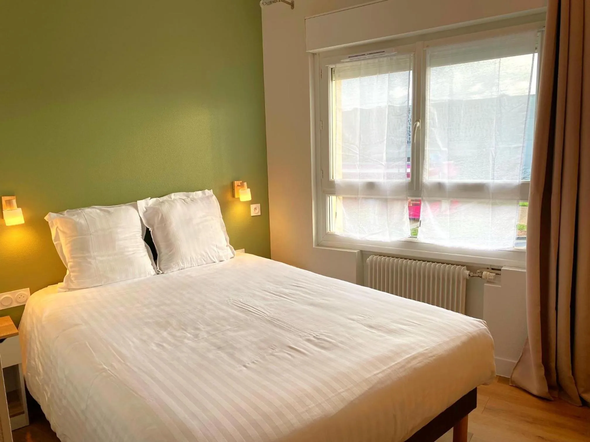 Bed in Hotel de Bretagne