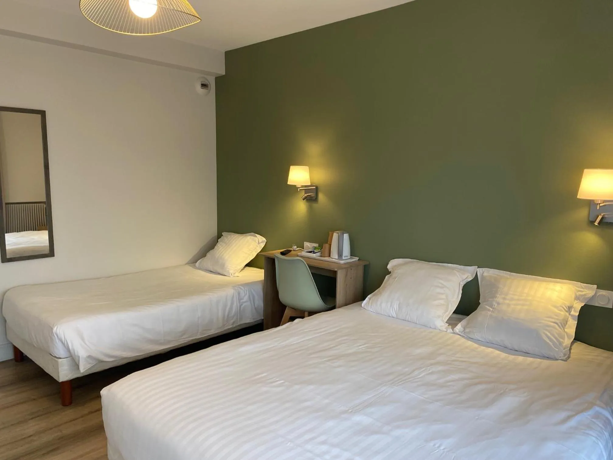 Bed in Hotel de Bretagne