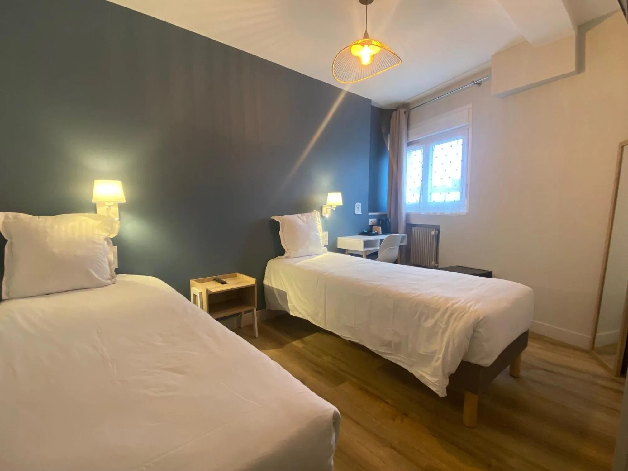 Bed in Hotel de Bretagne