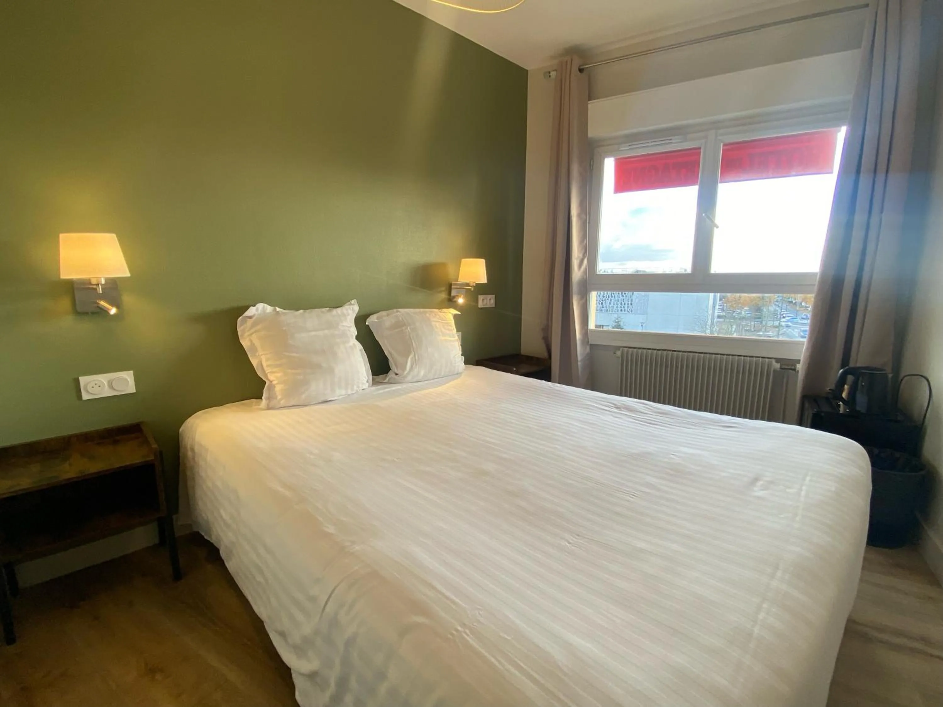 Bed in Hotel de Bretagne