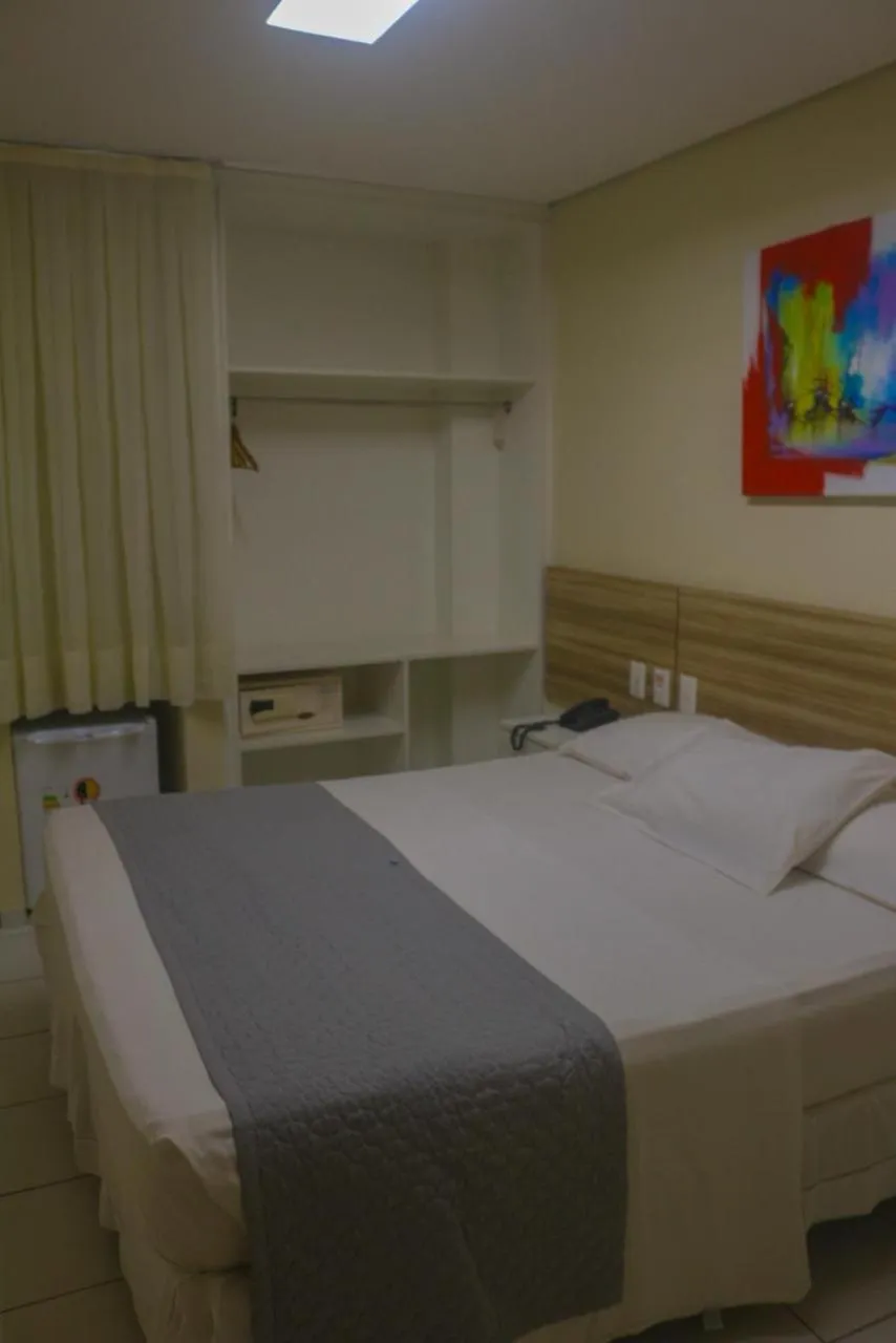 Bed in Hotel Três Caravelas