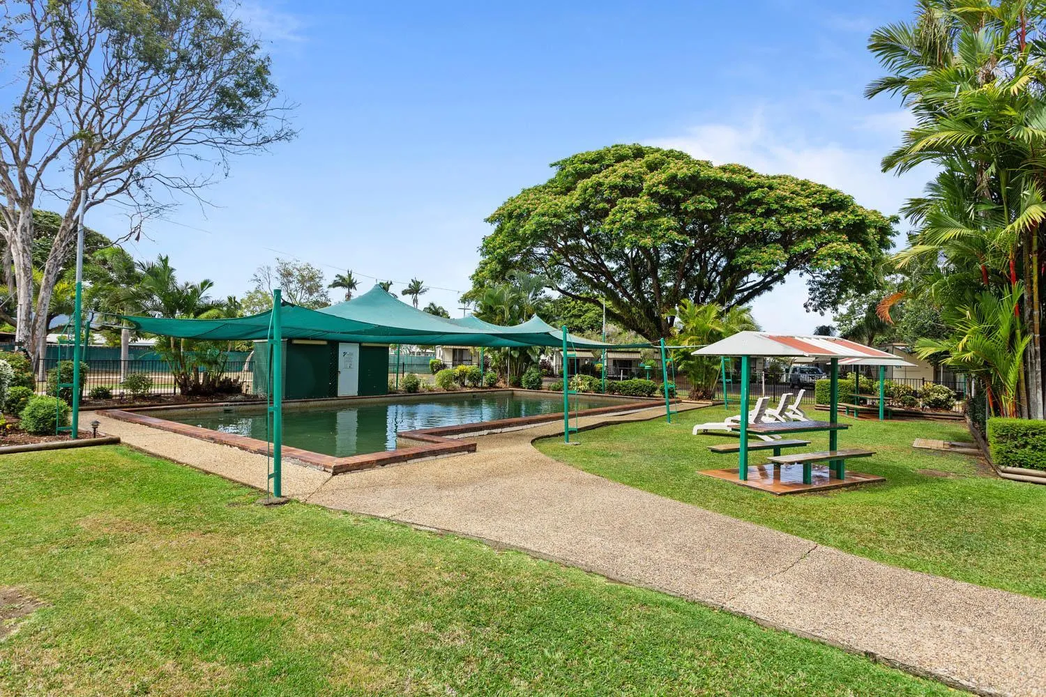 Swimming pool in First City Caravilla